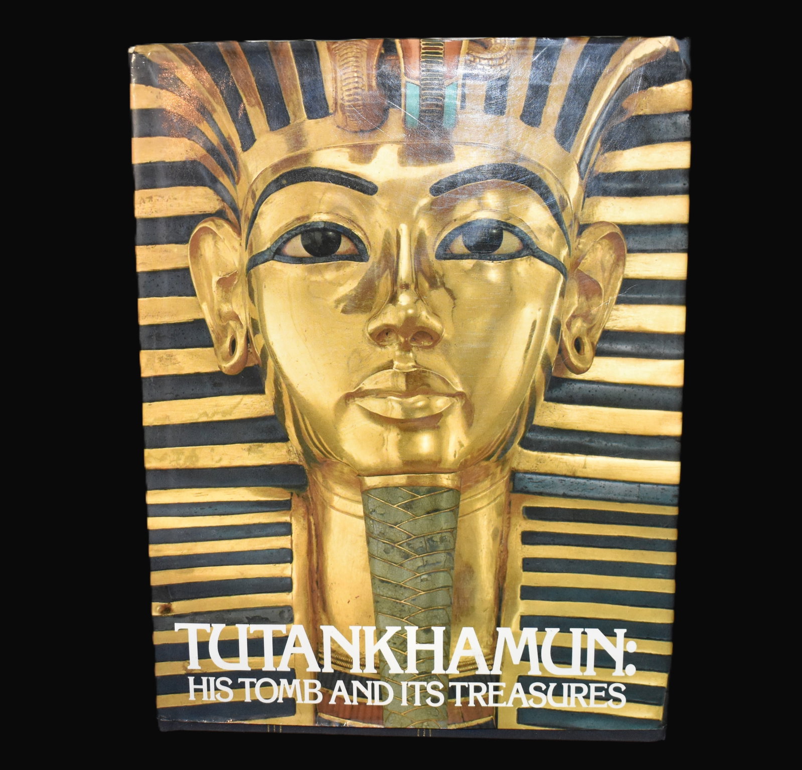 Tutankhamun: His Tomb and It's Treasures by I.E.S. Edwards: Tutankhamun: His Tomb and It's Treasures by I.E.S. Edwards. Published by The Metropolitan Museum of Art & Alfred A. Knopf, NY 1978. Excellent condition hardback with dust cover.