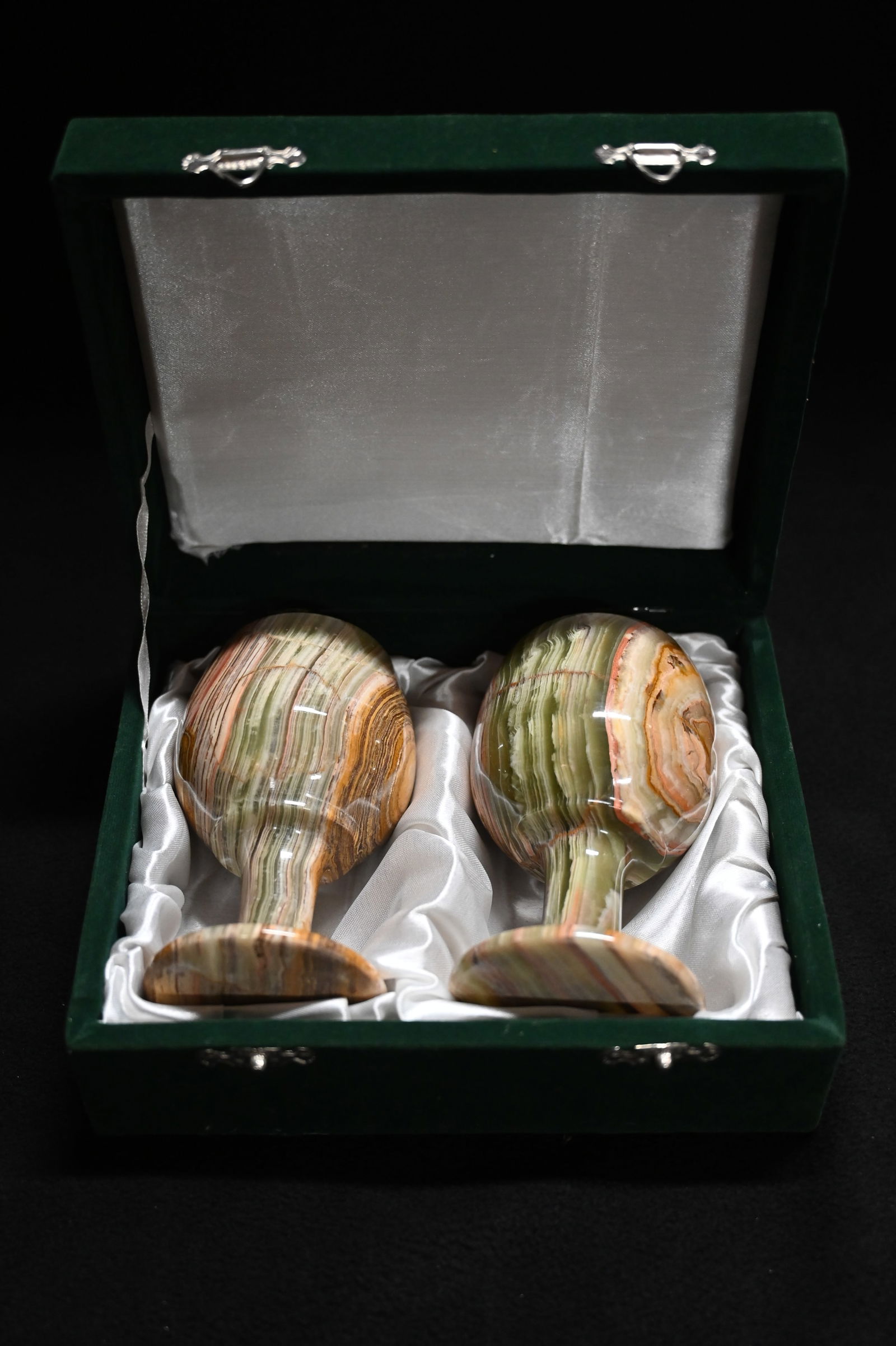 Pair of Smithsonian Institute Travertine 5" Goblets in the original case with the description card.: Pair of Smithsonian Institute Travertine 5" Goblets in the original case with the description card. Very beautiful natural stone carved Goblets.