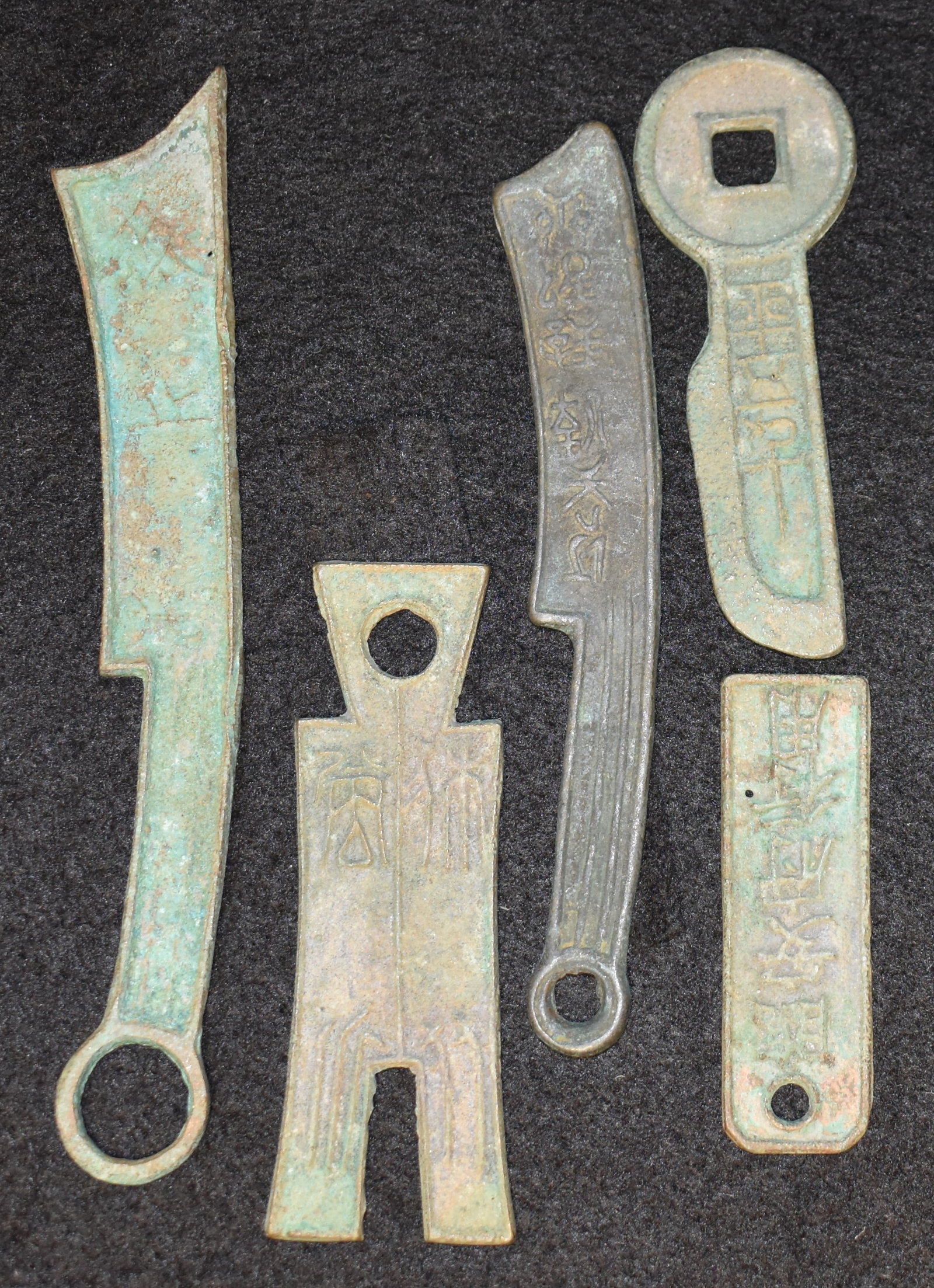 Chinese Coins and Pendants Age Unknown: Chinese Coins and Pendants Age Unknown. These pieces measure 3" to 7" approximately.