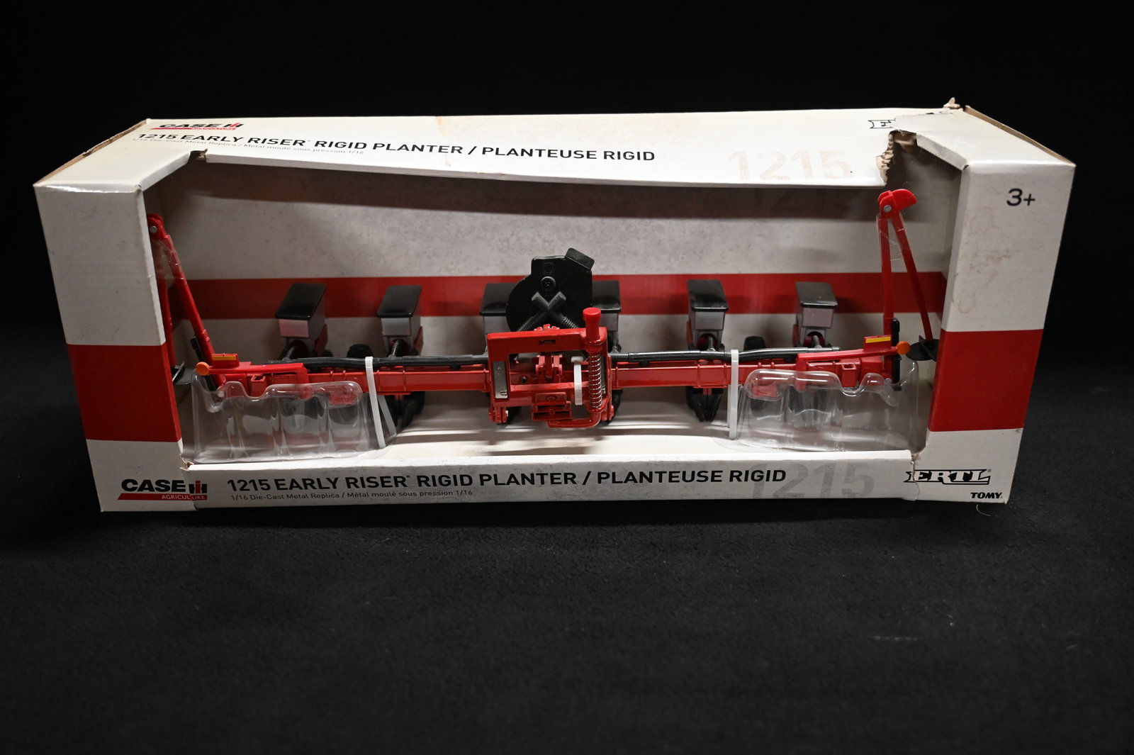 Ertl 18" Case 1215 Early Planter.: Ertl 18" Case 1215 Early Planter. Plastic and brand new in the original box.