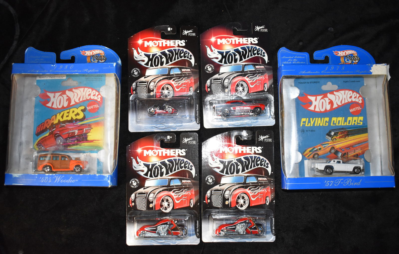 Vintage Hot Wheels Mother's, Flying Colors & HiRackers 1:64 Scale Collector Diecast Cars: Vintage Hot Wheels Mother's, Flying Colors & HiRackers 1:64 Scale Collector Diecast Cars. New in their boxes from 1997 to 2002. Some wear to the Flying colors and Hiracker boxes as shown in photos.