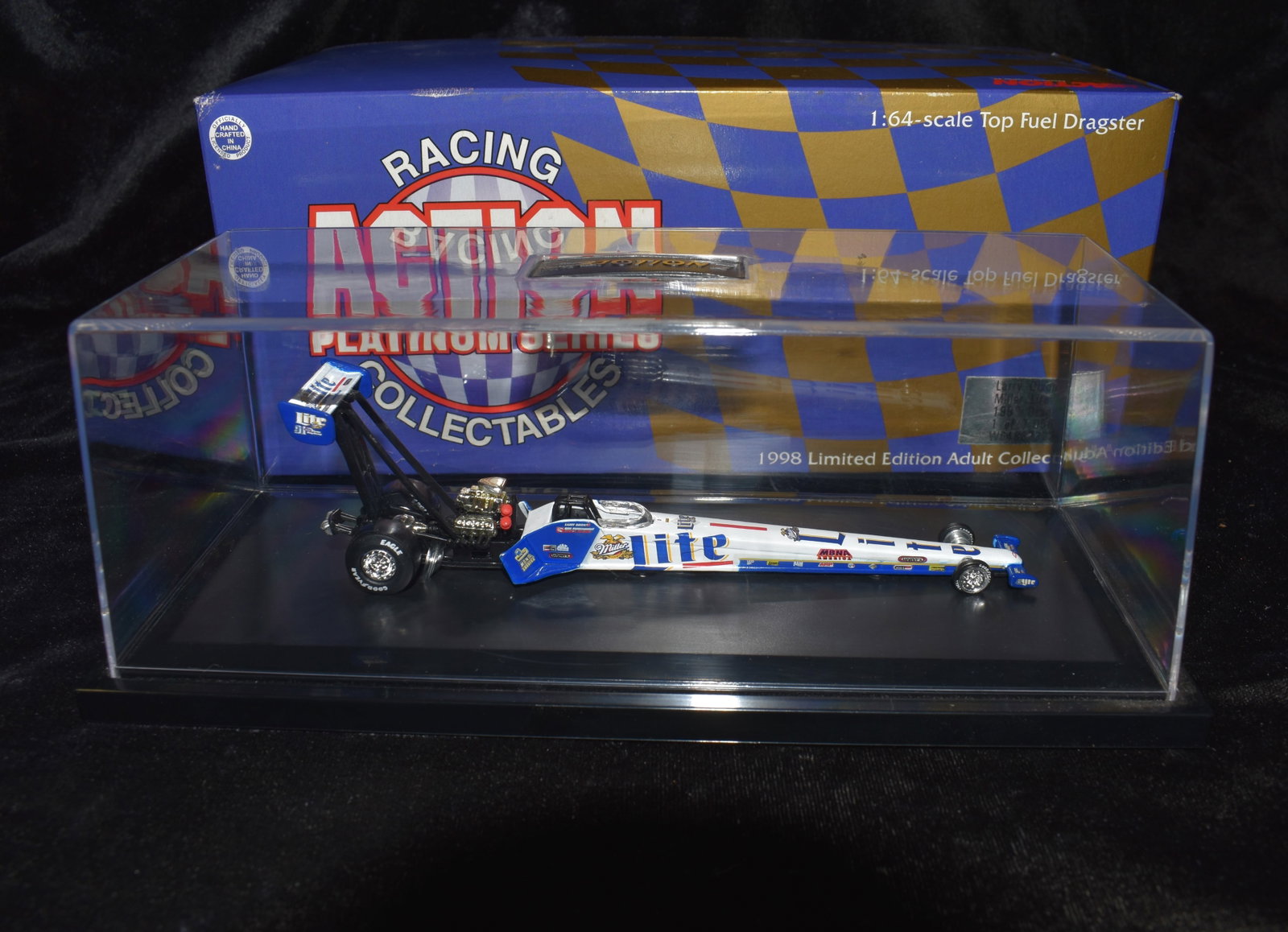 1998 Larry Dixon Miller Lite Dragster 1 of 7056 1:64 Scale Action Platinum Series Diecast: 1998 Larry Dixon Miller Lite Dragster 1 of 7056 1:64 Scale Action Platinum Series Diecast Collectible. As new in its original box.