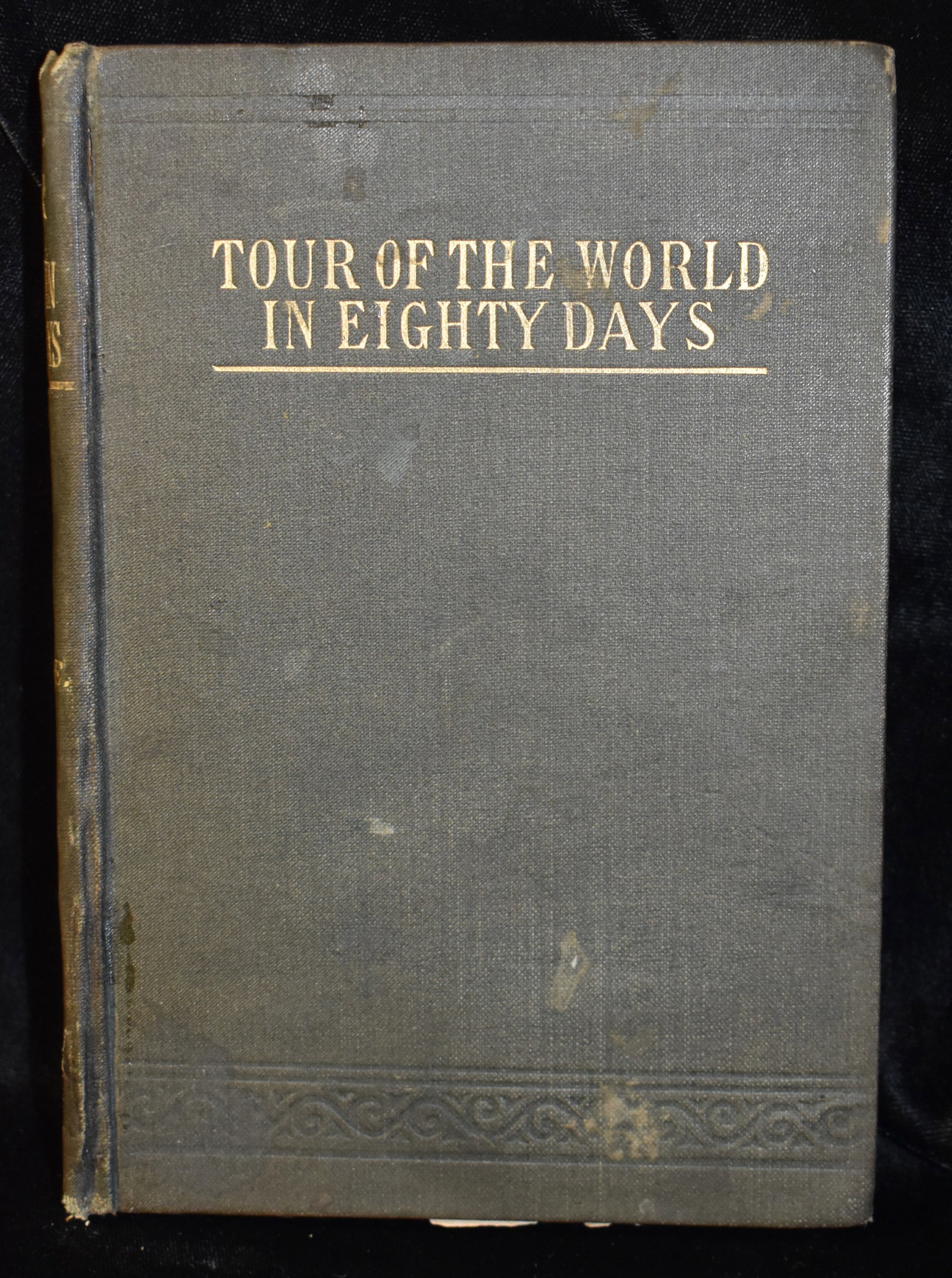 1880 Tour of the World in Eighty Days by Jules Verne 1st British Edition: Tour of the World in Eighty Days by Verne, Jules. Published by Richard Edward King London circa 1880. 1st British Version in this format. Condition on this book is poor. Cover is still intact with she