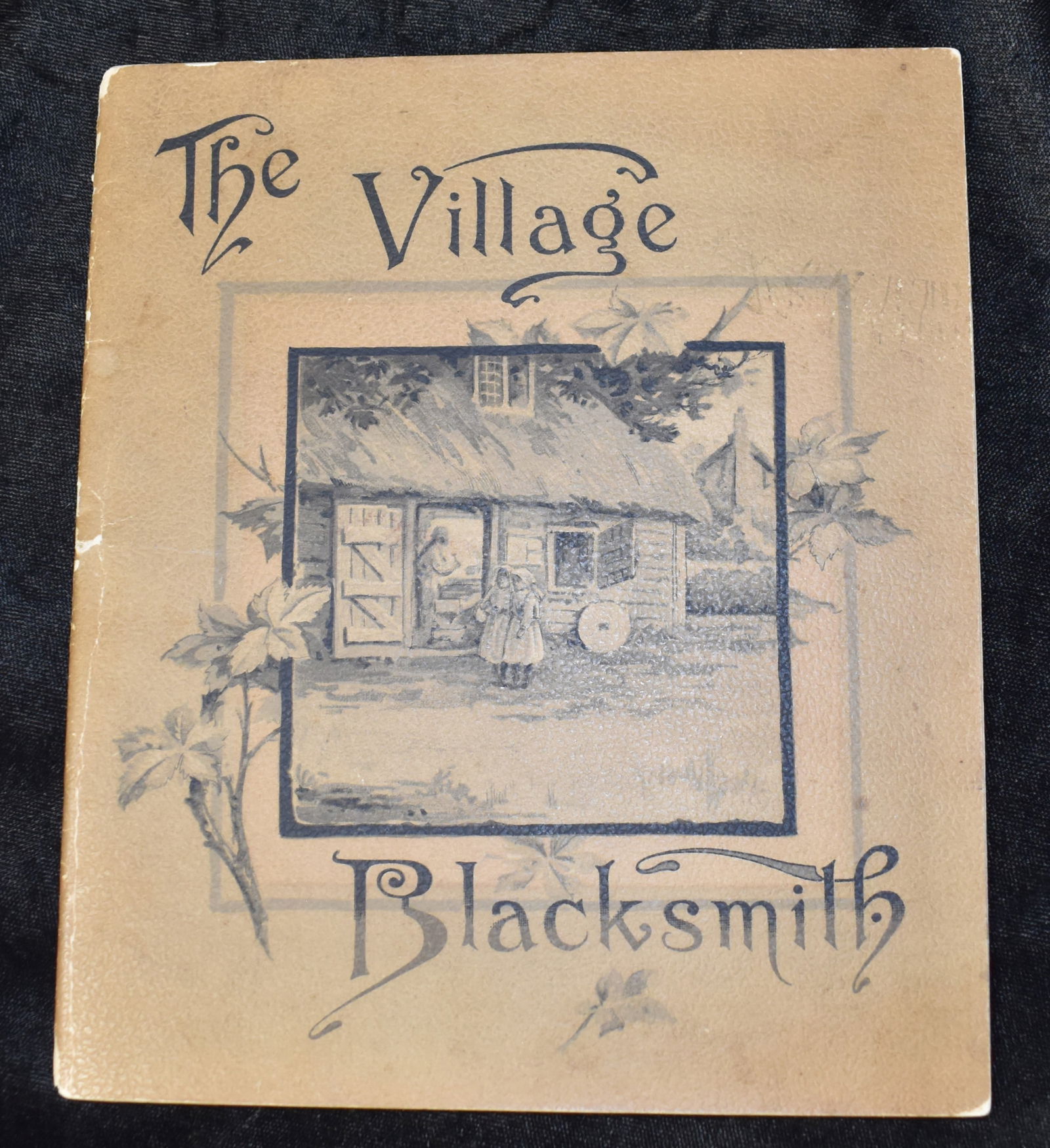 1888 The Village Blacksmith by Henry Wadsworth Longfellow: The Village Blacksmith by Longfellow, Henry Wadsworth. Published by Fleming Revell, New York or John Walker and Company, London 1888. Softback in Good Condition. Cover is worn on the edges. Internally
