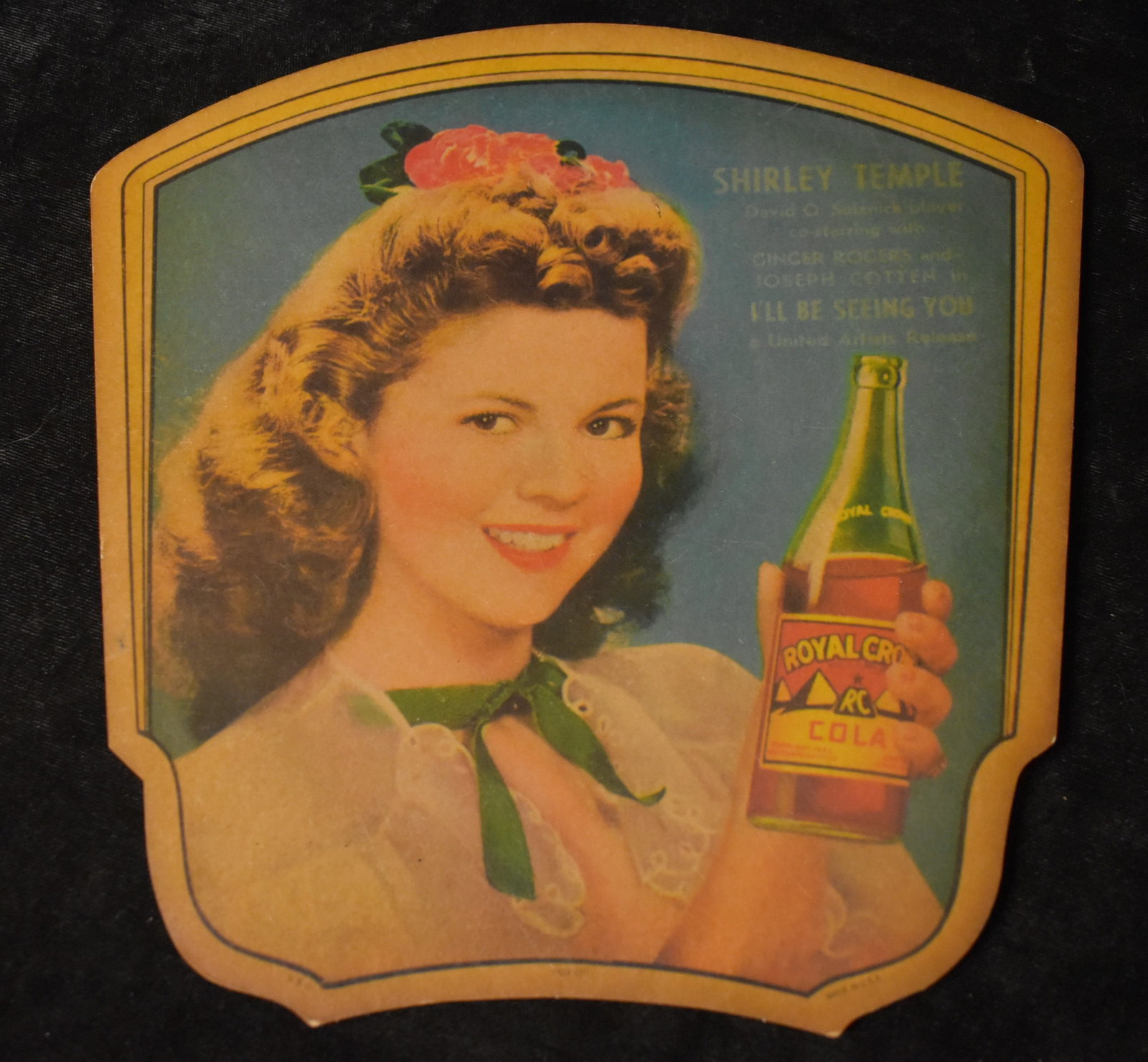 Original circa 1944 Royal Crown Shirley Temple Advertising Sign: Original circa 1944 Royal Crown Shirley Temple Advertising Sign. Circa 1944 this hand sign was used to advertise Royal Crown Soda but also on the back advertised for War Bonds. Very good condition for