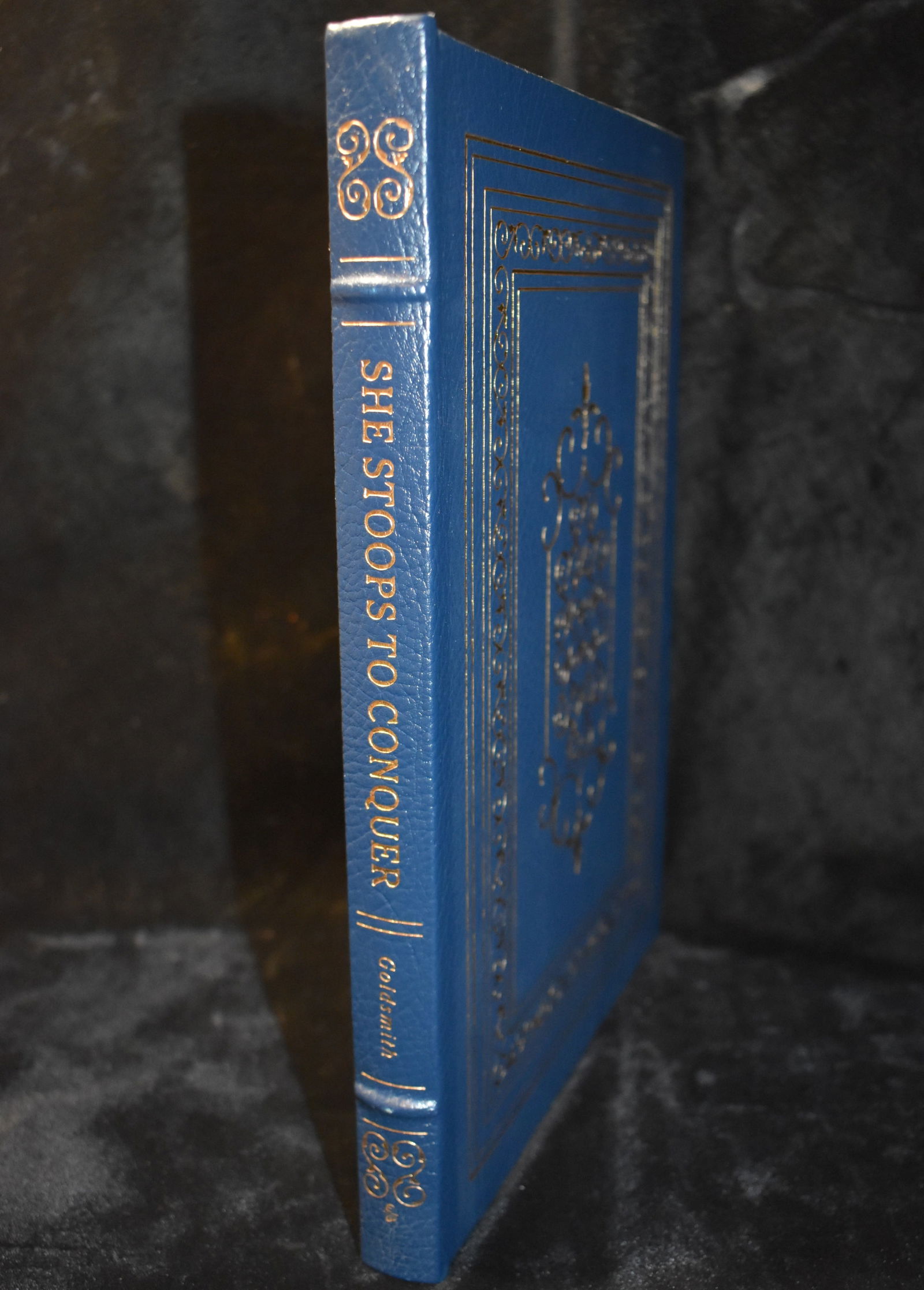 She Stoops to Conquer by Oliver Goldsmith - 1978 Easton Press Full Leather Hardback: She Stoops to Conquer or The Mistakes of a Night by Goldsmith, Oliver. Published by Easton Press, 1978. Fine condition full leather hardback with gold gilt to cover and page edges. Collector's Edition