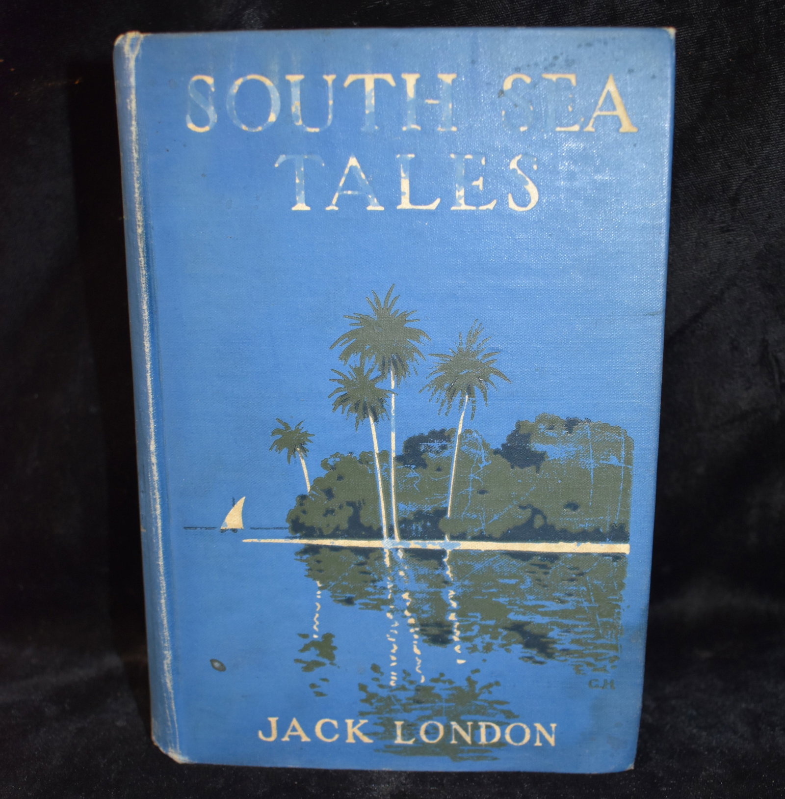 1911 1st Edition - South Sea Tales by Jack London: South Sea Tales by London, Jack. Published by The Macmillan Company, 1911. Hardback in Good + Condition. Cover has some wear with fading to the spine. Staining to a few pages.