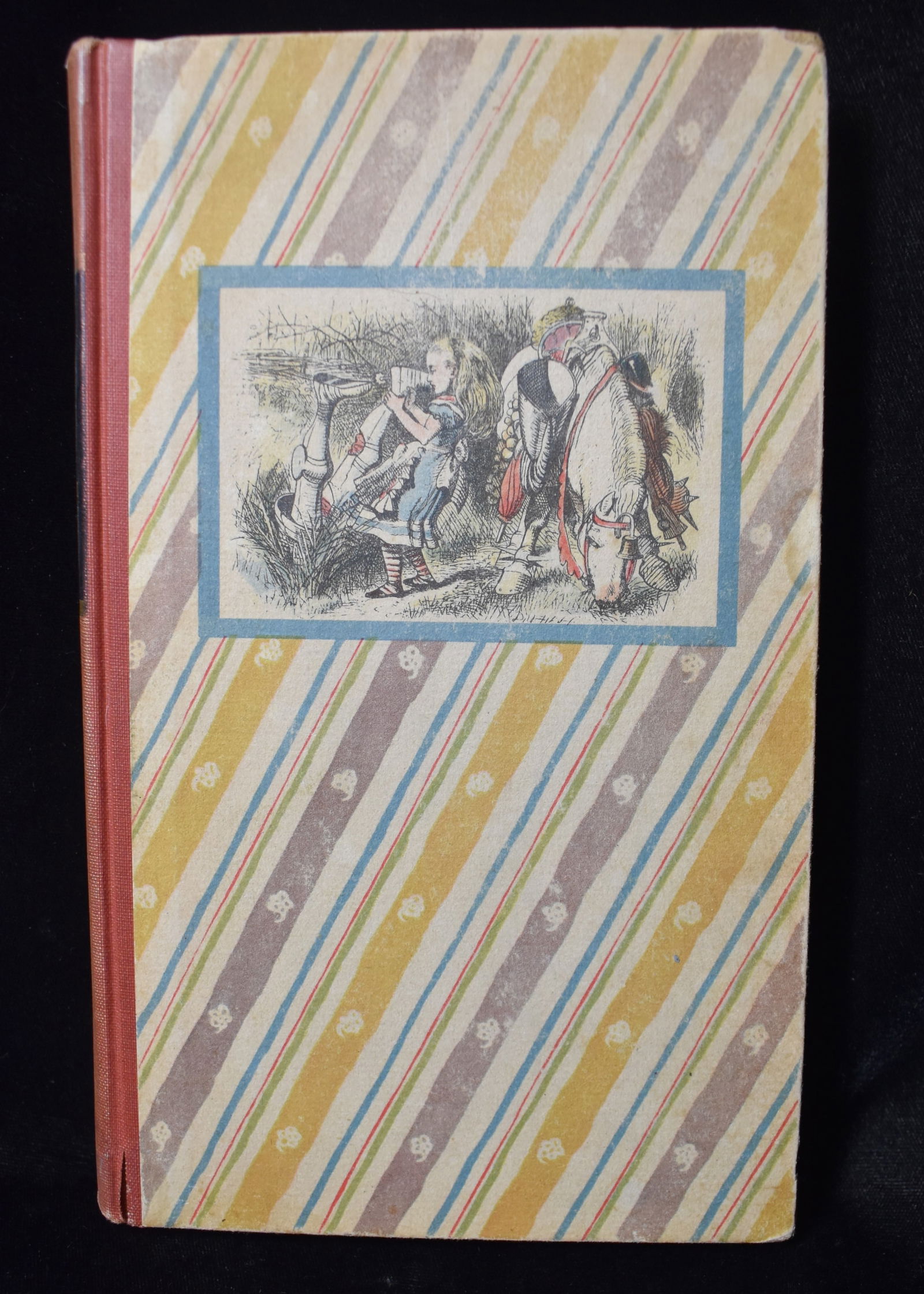 1946 Through the Looking Glass and what Alice Found There by Lewis Carroll: Through the Looking Glass and what Alice Found There by Carroll, Lewis. Published by Random House, 1946. Special Edition. Good condition hardback. Cover has some wear. Internally tight and very nice.