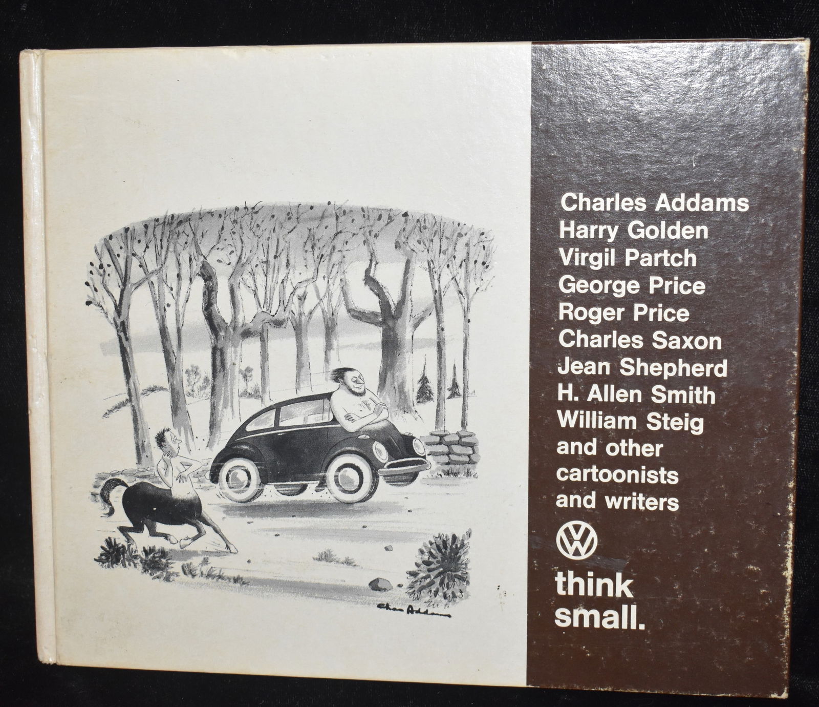 1967 VW Think Small by Charles Addams - Volkswagon Promotional Cartoon Book: VW Think Small by Charles Addams, et. al.. Published by Volkswagon of America, 1967. Good condition hardback. Cartoon art book by many different cartoon artists for Volkswagon. A little shelf wear to