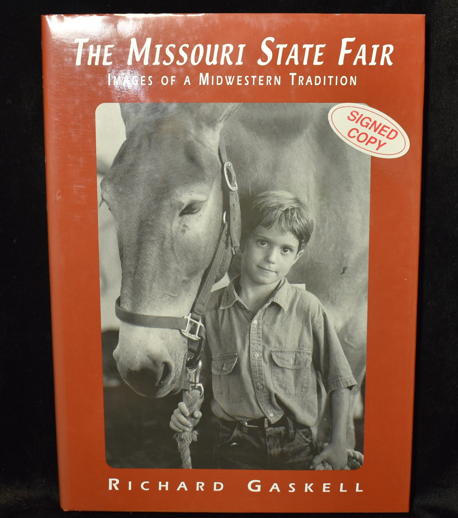 2000 The Missouri State Fair: Images of a Midwestern Tradition Signed by the Author: The Missouri State Fair: Images of a Midwestern Tradition by Gaskell, Richard. Published by University of Missouri, 2000. Signed by the Author. Excellent condition hardback with dust cover.