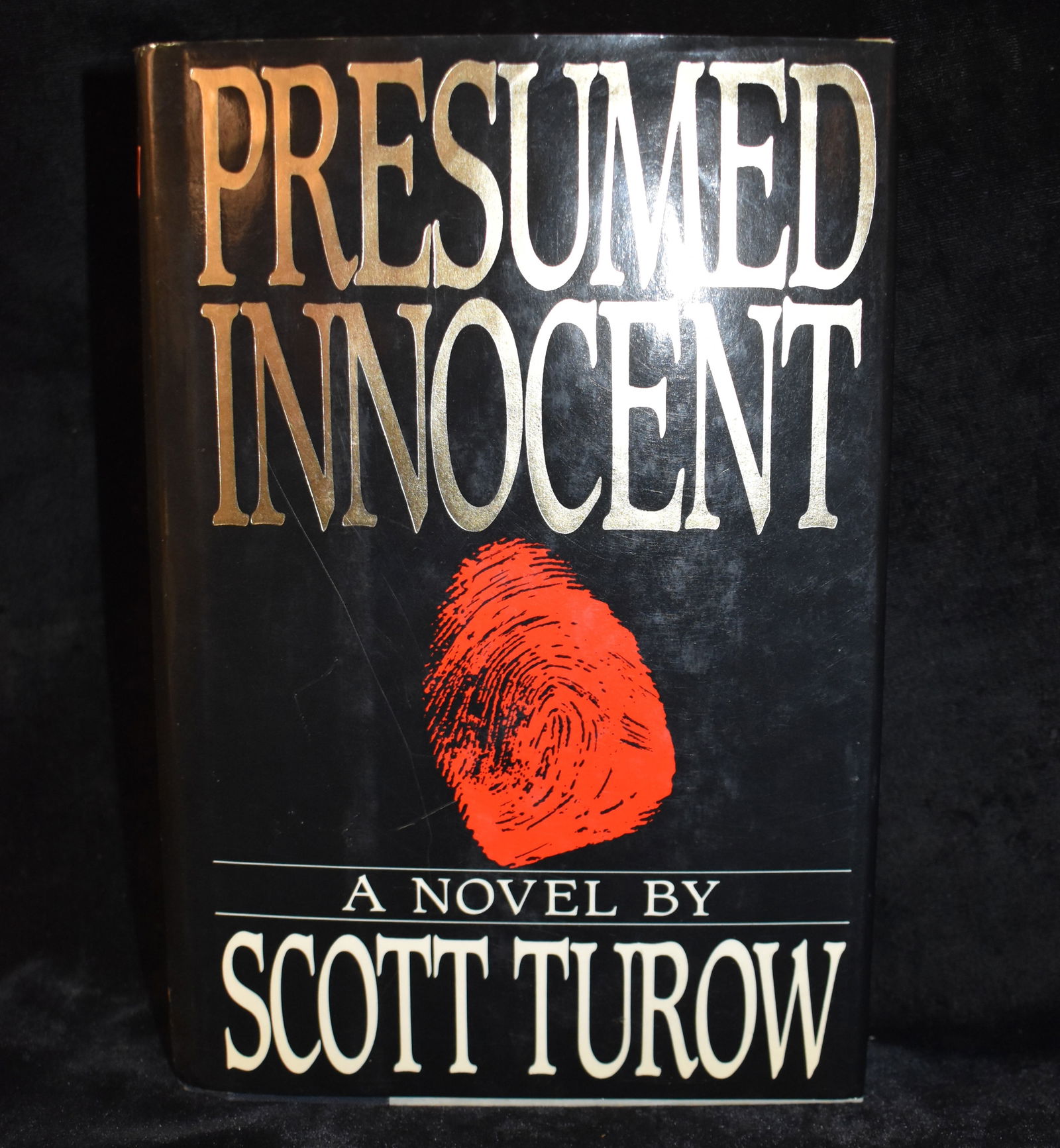 Presumed Innocent by Scott Turow - 1987 Hardback w/ Dust Cover: Presumed Innocent by Turow, Scott. Published by Farrar Straus Giroux, 1987. Excellent condition hardback with its original dust cover.