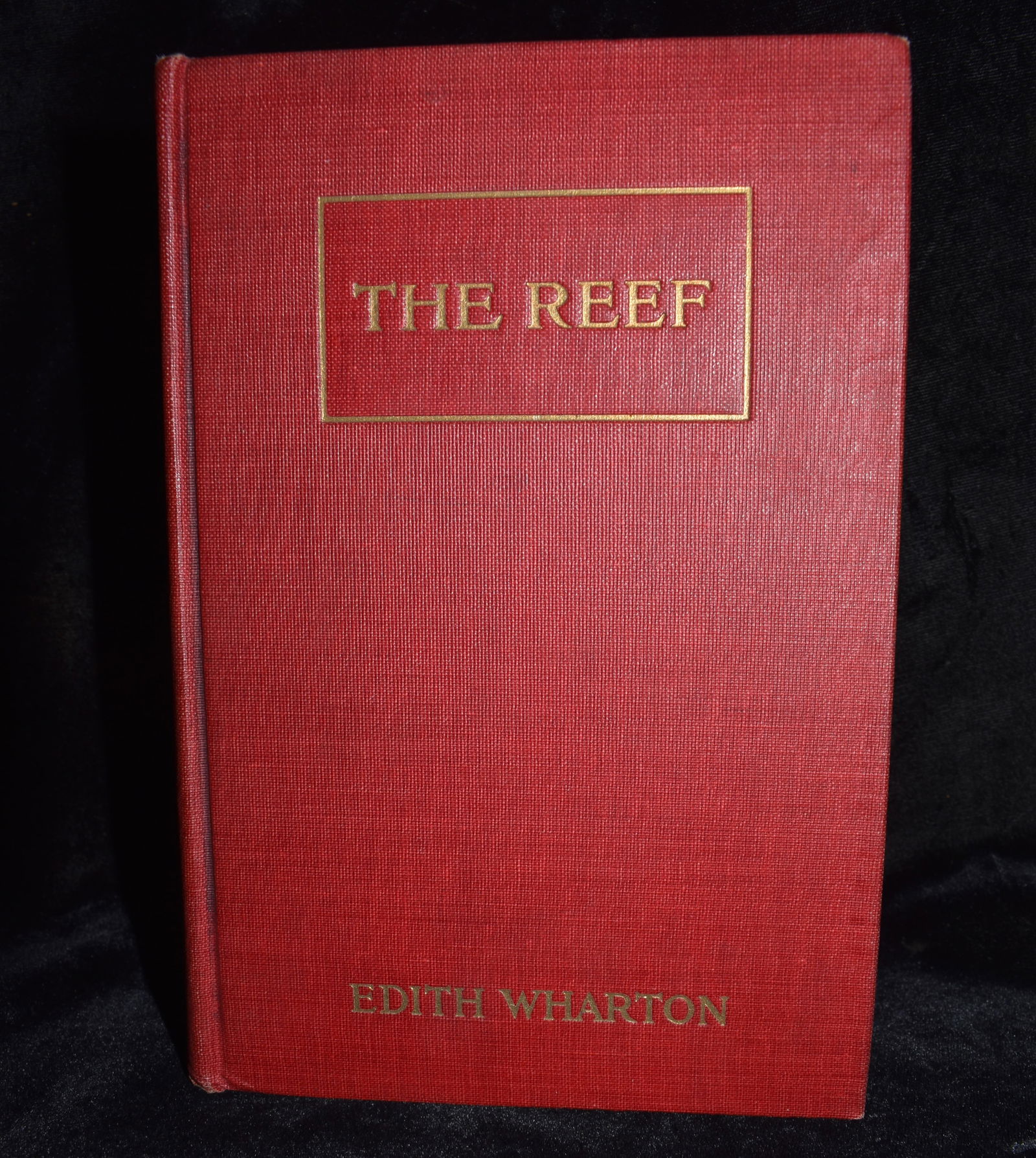 1912 The Reef A Novel by Edith Wharton: The Reef A Novel by Wharton, Edith. Published by Syndicate Publishing Company, New York, 1912. Very good condition hardback. Minor shelf wear.