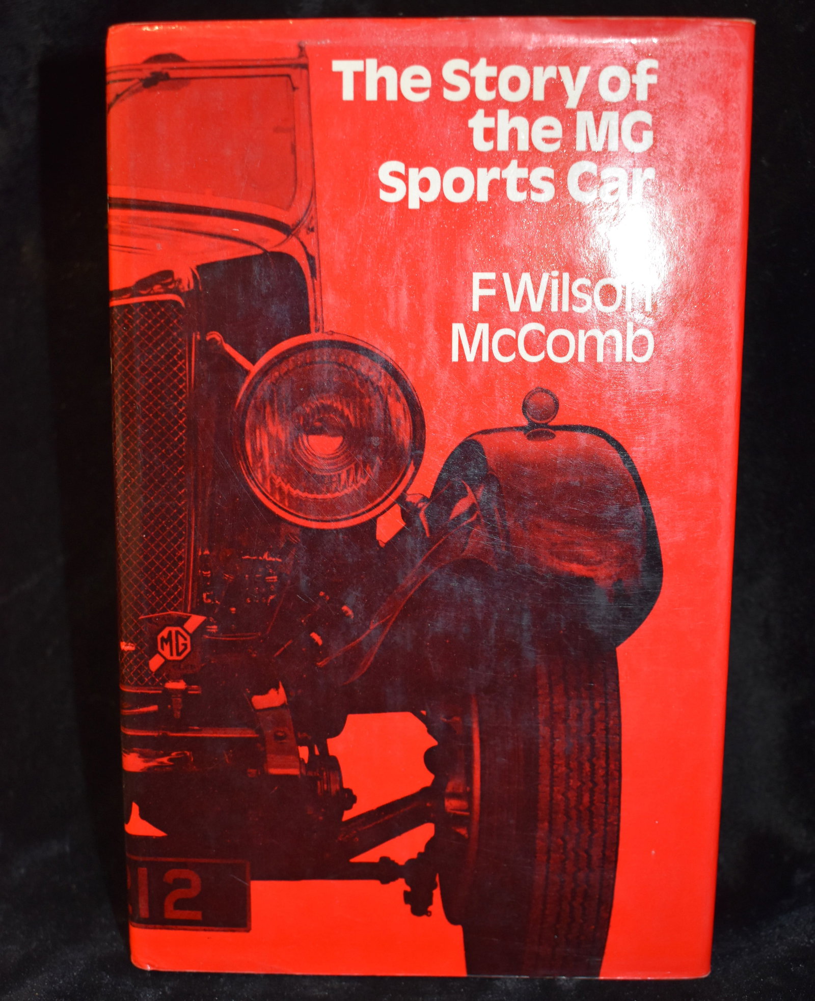 The Story Of The M.G. Sports Car with 100 Illustrations by Wilson McComb - 1972 Hardback: The Story Of The M.G. Sports Car with 100 Illustrations by McComb, F. Wilson. Published by St. Martin's Press, New York, 1972. Excellent condition hardback w/ dust cover.