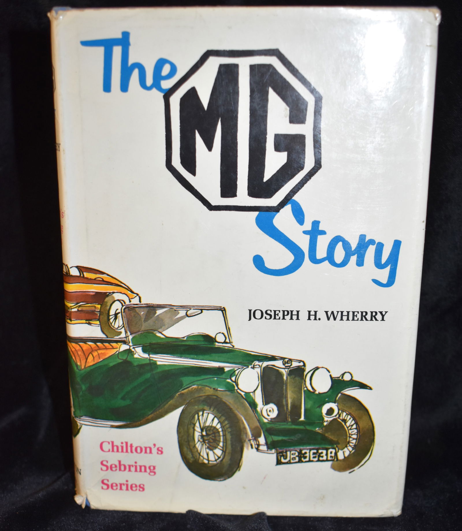 1967 1st Edition The MG Story - The Story of Every M.G. from "Old No. 1" in 1923: The MG Story - The Story of Every M.G. from "Old No. 1" in 1923 to the most modern, with specifications and photos, (Chilton's Sebring series) by Wherry, Joseph H.. Published by Chilton Books, 1967. 1