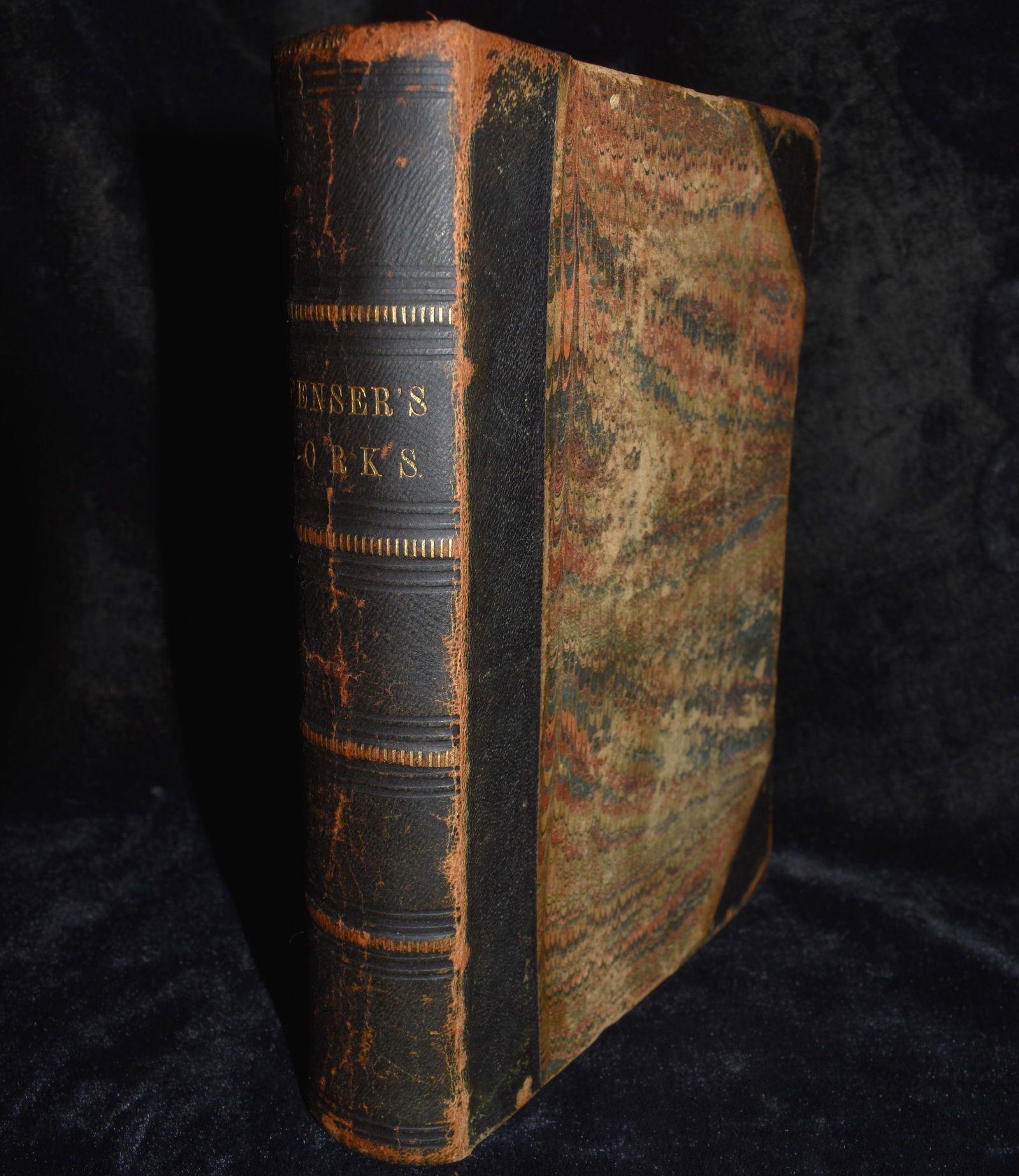 1860 The Poetical Works of Edmund Spenser - Half Leather Hardback: The Poetical Works of Edmund Spenser by Spenser, Edmund. Published by Charles C. Little and James Brown, Boston, 1860. Publishers original half leather hardback with colorful boards. Cover has much we