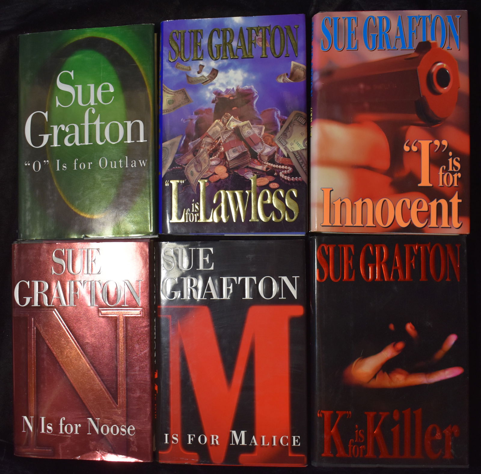 Sue Grafton 6 1st Edition Hardback Books: Published by Henry Holt, New York. N Is For Noose 1998 1st Edition, I is for Innocent 1992 1st edition, M is for Mailce 1996, L is for Lawless 1995 1st edition, K is for Killer 1994 1st edition, O is