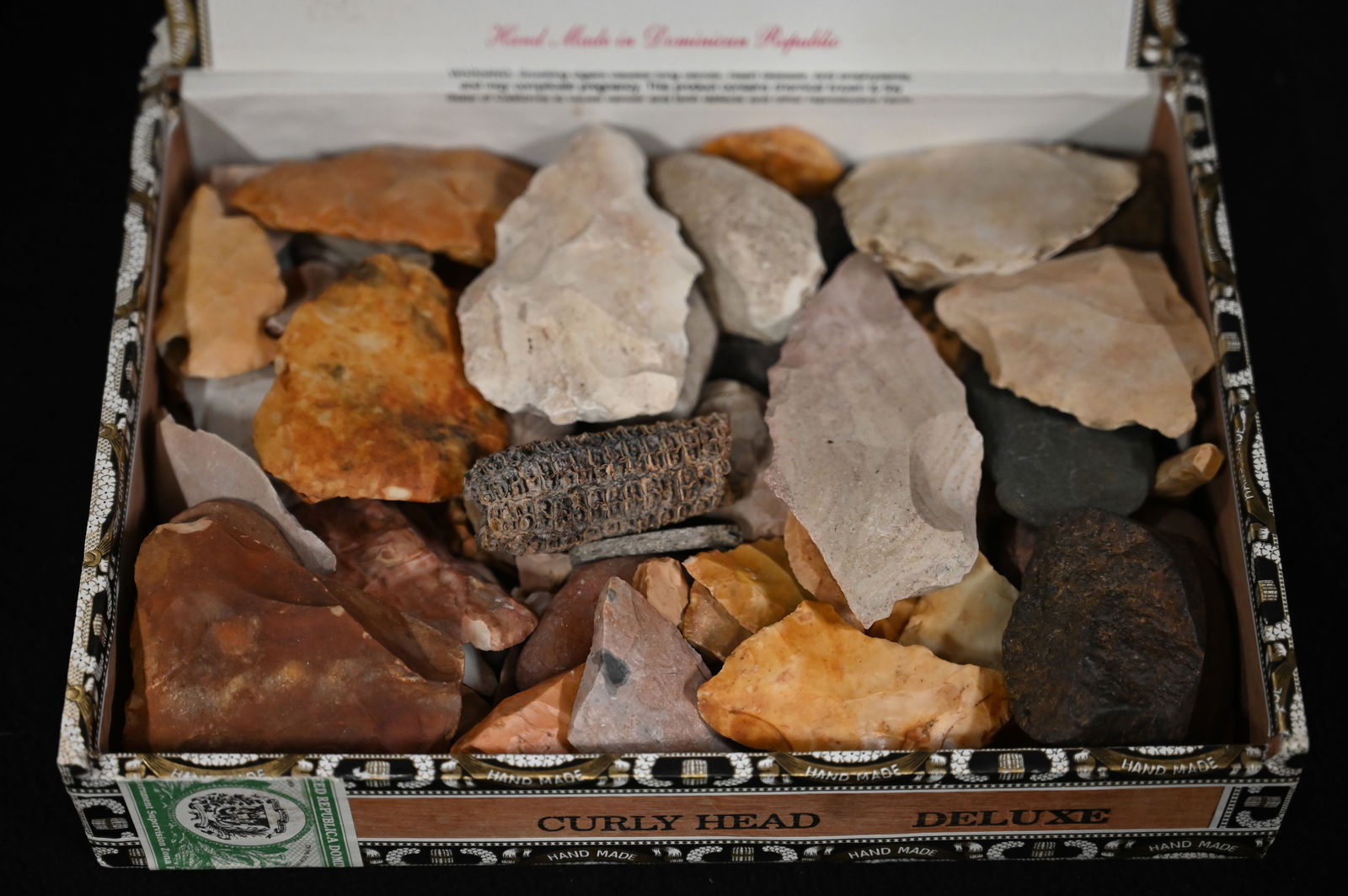 Cigar Box Full of Damaged Arrowheads and Stone Tools Found in Illinois. Cigar Box measures approx.: Cigar Box Full of Damaged Arrowheads and Stone Tools Found in Illinois. Cigar Box measures approx. 8" x 6 1/2" x 3". Weighs approx. 5 pounds.
