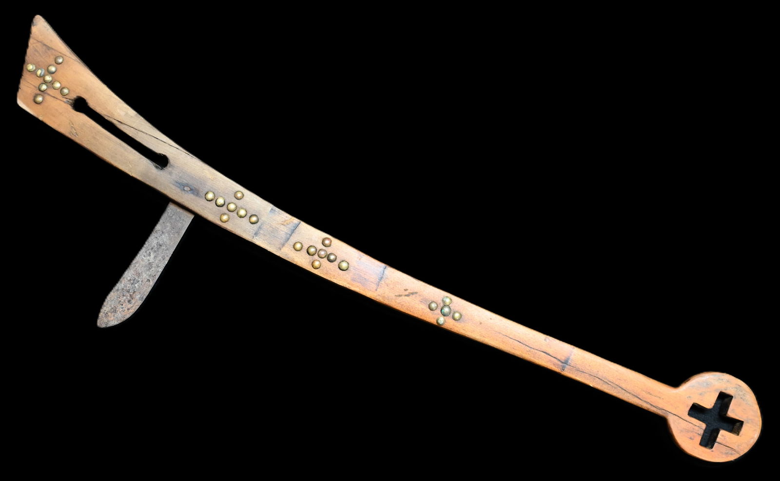 Gun Stock War Club Tacked 30 1/2": The gunstock war club is a traditional Indigenous weapon used by various Native American and First Nations tribes, especially prominent among Eastern Woodland and Plains peoples during the 18th and 19