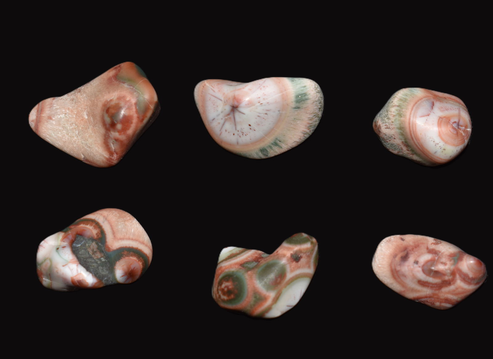 6 Multi-Color Lake Superior Thompsonite Specimens: 6 Multi-Color Lake Superior Thompsonite Specimens. Very nice jewelry grade Thompsonite Stones measuring 1/2" to 1" approximately