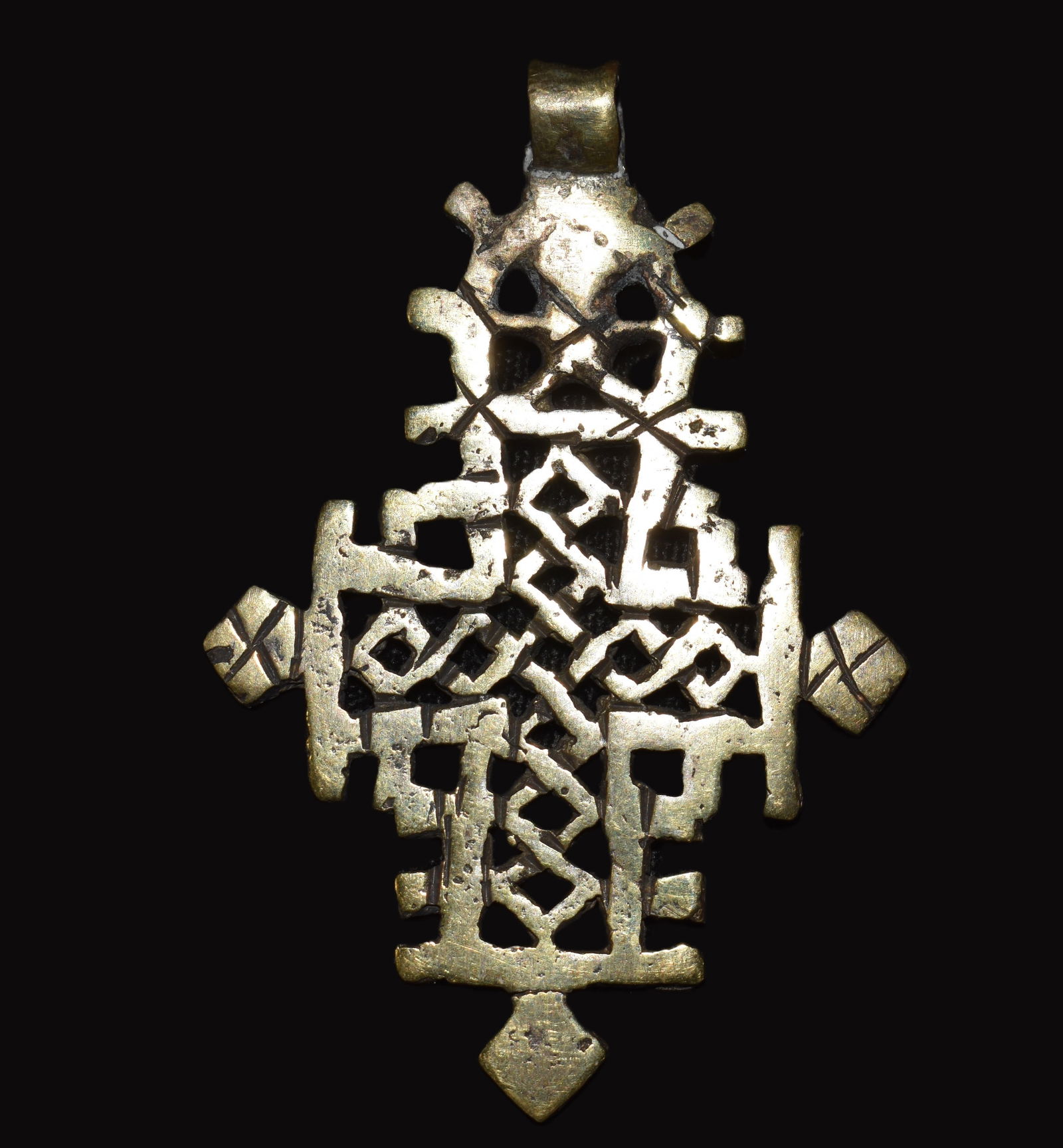 Silver Ethiopian Coptic Cross Pendant - Late 19th to Early 20th Century: Coptic African Hand Made Silver Cross Pendant - Late 19th to Early 20th Century. These crosses were historically made from various materials, including wood, bone, and leather. However, as silver beca