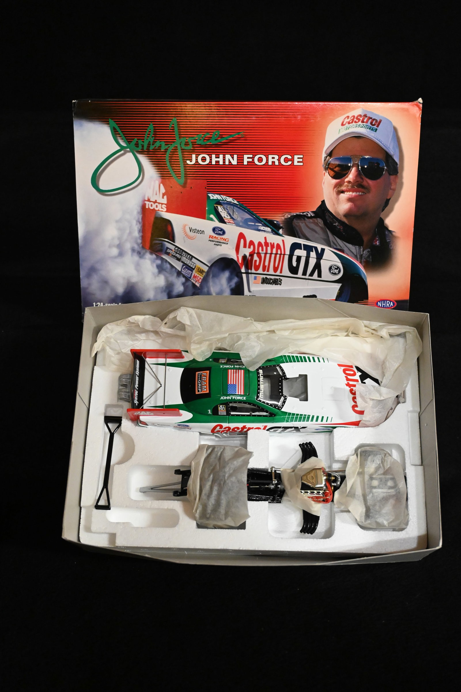 1999 John Force "Castrol GTX" 1/24 Scale NHRA Funny Car Produced by Action Racing Collectables.: 1999 John Force "Castrol GTX" 1/24 Scale NHRA Funny Car Produced by Action Racing Collectables.