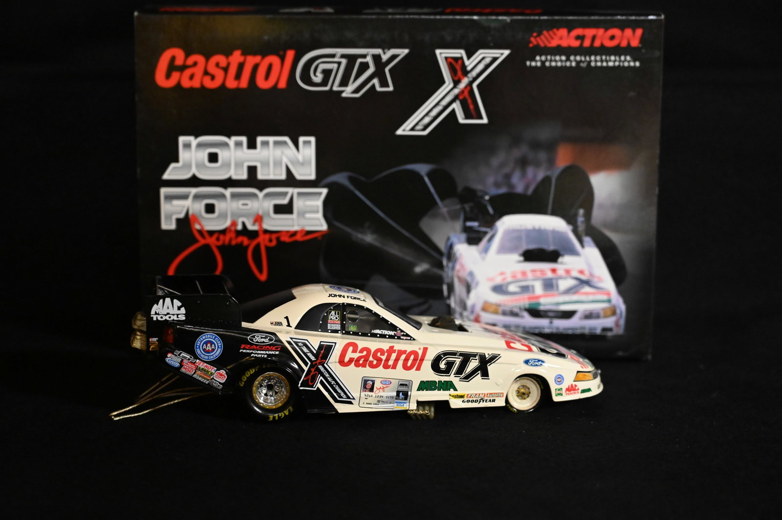 2001 John Force Signed "Castrol GTX" 1/24 Scale NHRA Funny Car Produced by Action Racing: 2001 John Force Signed "Castrol GTX" 1/24 Scale NHRA Funny Car Produced by Action Racing Collectables.