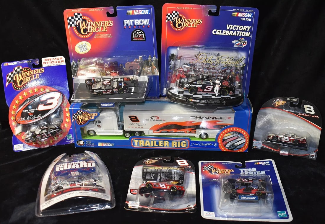 Dale Earnhardt Jr Collection of Diecast Cars by Winner's Circle: Dale Earnhardt Jr Collection of Diecast Cars by Winner's Circle. This collection contains cars made between the late 1990's and 2010. The Semi w/ Trailer is a larger scale. Most are 1:64 and 1:32 Scal