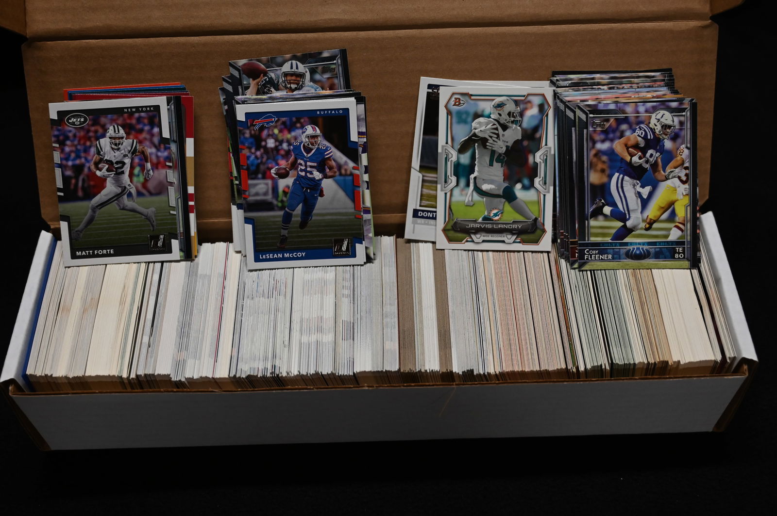 Mixed Group of Approx. 800 Football Cards 80's, 90's, 2000's.: Mixed Group of Approx. 800 Football Cards 80's, 90's, 2000's. All Cards are in good to great condition. We made sure the boxes were full and did not search through them. Should find some good cards in