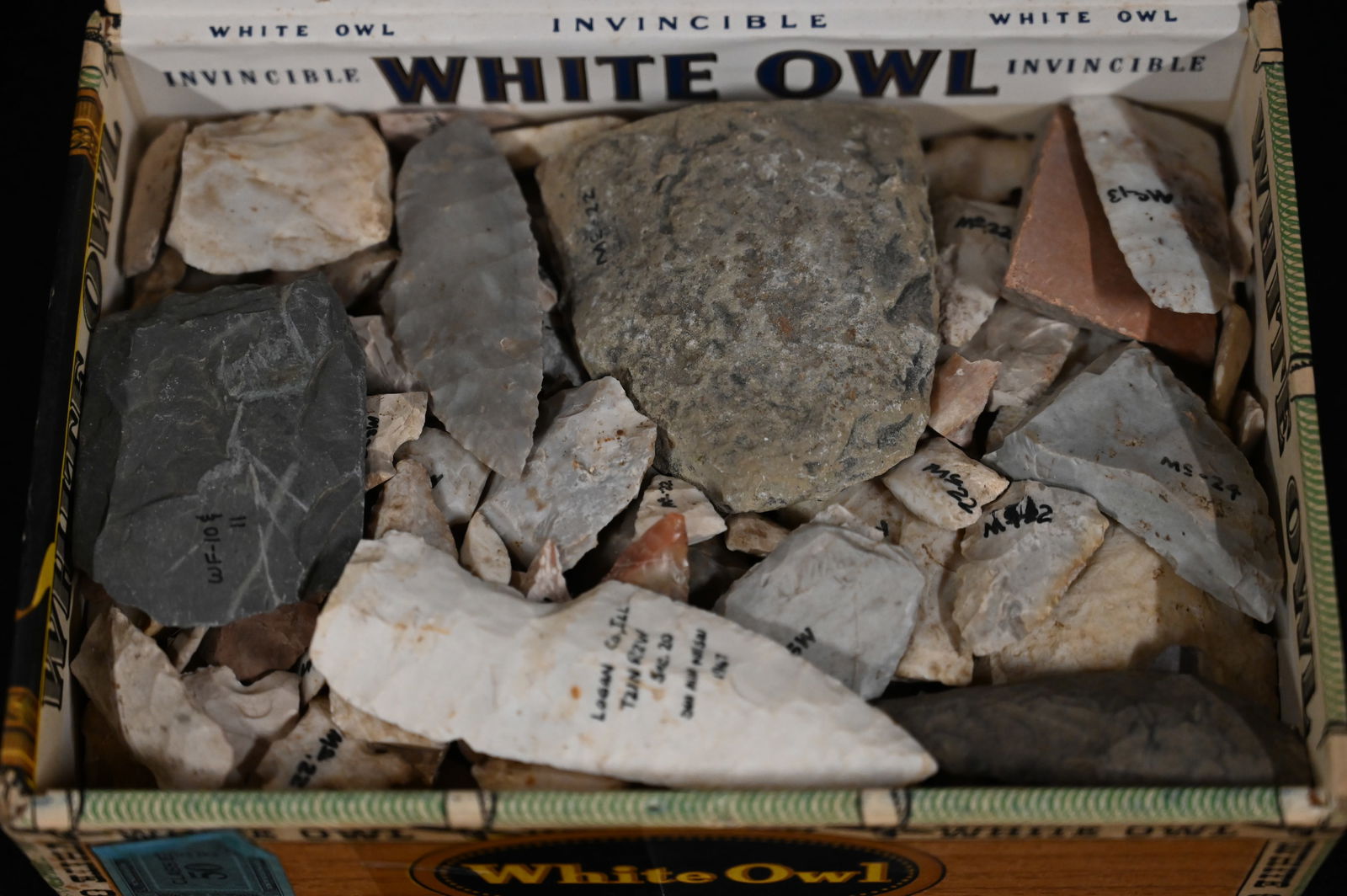 Cigar Box Full of Damaged Arrowheads Found in Fulton Co. Illinois and surrounding Counties. Cigar: Cigar Box Full of Damaged Arrowheads Found in Fulton Co. Illinois and surrounding Counties. Cigar Box measures approx. 8 1/2" x 5 1/2" x 3". Weighs approx. 5 pounds.