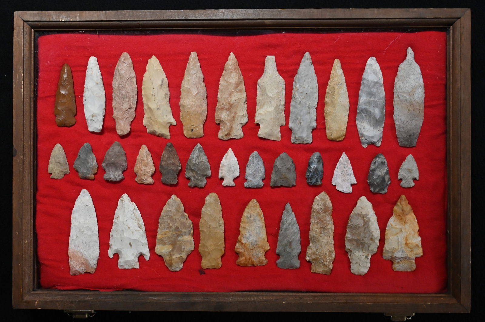 Frame of 33 Arrowheads Found in Central Missouri 4" Longest. Includes Etley, Sedalia, Stanfield,: Frame of 33 Arrowheads Found in Central Missouri 4" Longest. Includes Etley, Sedalia, Stanfield, Drills, Gibson, Nebo Hill, and more. The 12"x 18" wood frame is included.