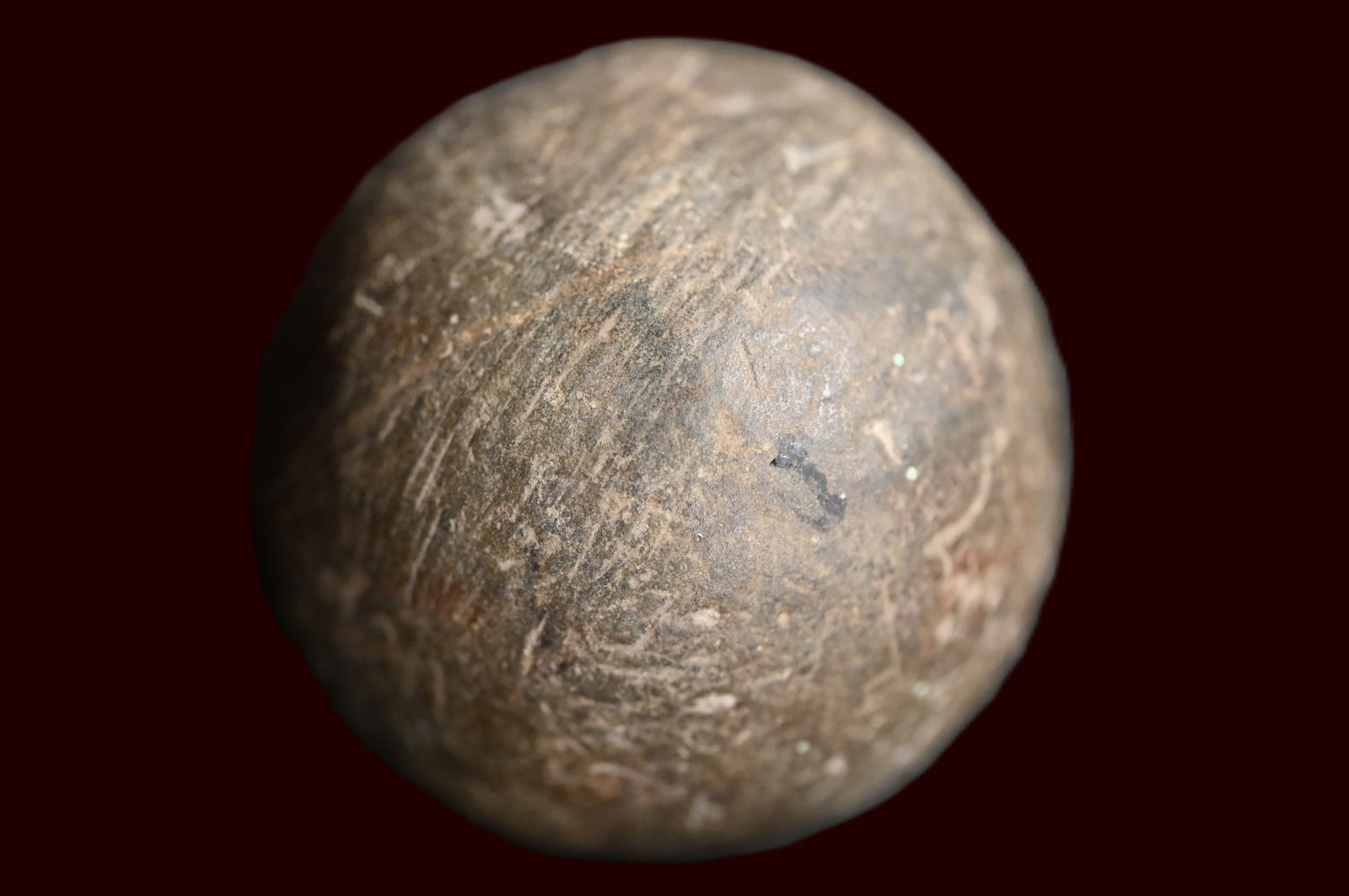 2 1/4" Granite Game Ball. Large well made example.: 2 1/4" Granite Game Ball. Large well made example.