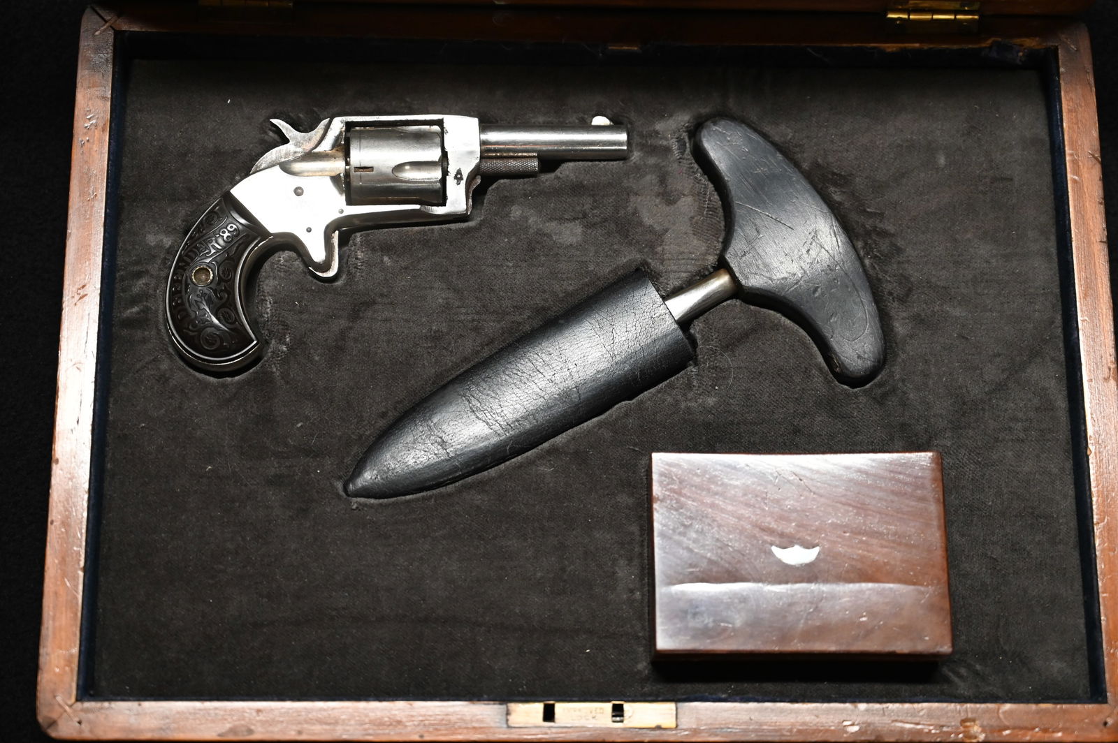 1800's Gambler Kit U.S. Defender 89 Revolver, M. Price San Francisco Push Knife , and Wood box with: 1800's Gambler Kit U.S. Defender 89 Revolver, M. Price San Francisco Push Knife , and Wood box with Dice and Poker Chips inside. 9 1/2" x 13 1/2" x 2 1/4" Wood Case.