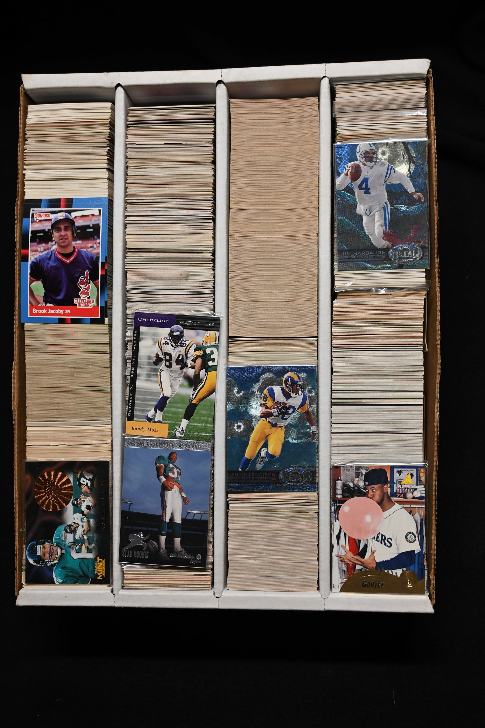3000 Approx. Baseball & Football Cards 80's & 90's Mixed group stored in a large collector card box. (1 of 3)