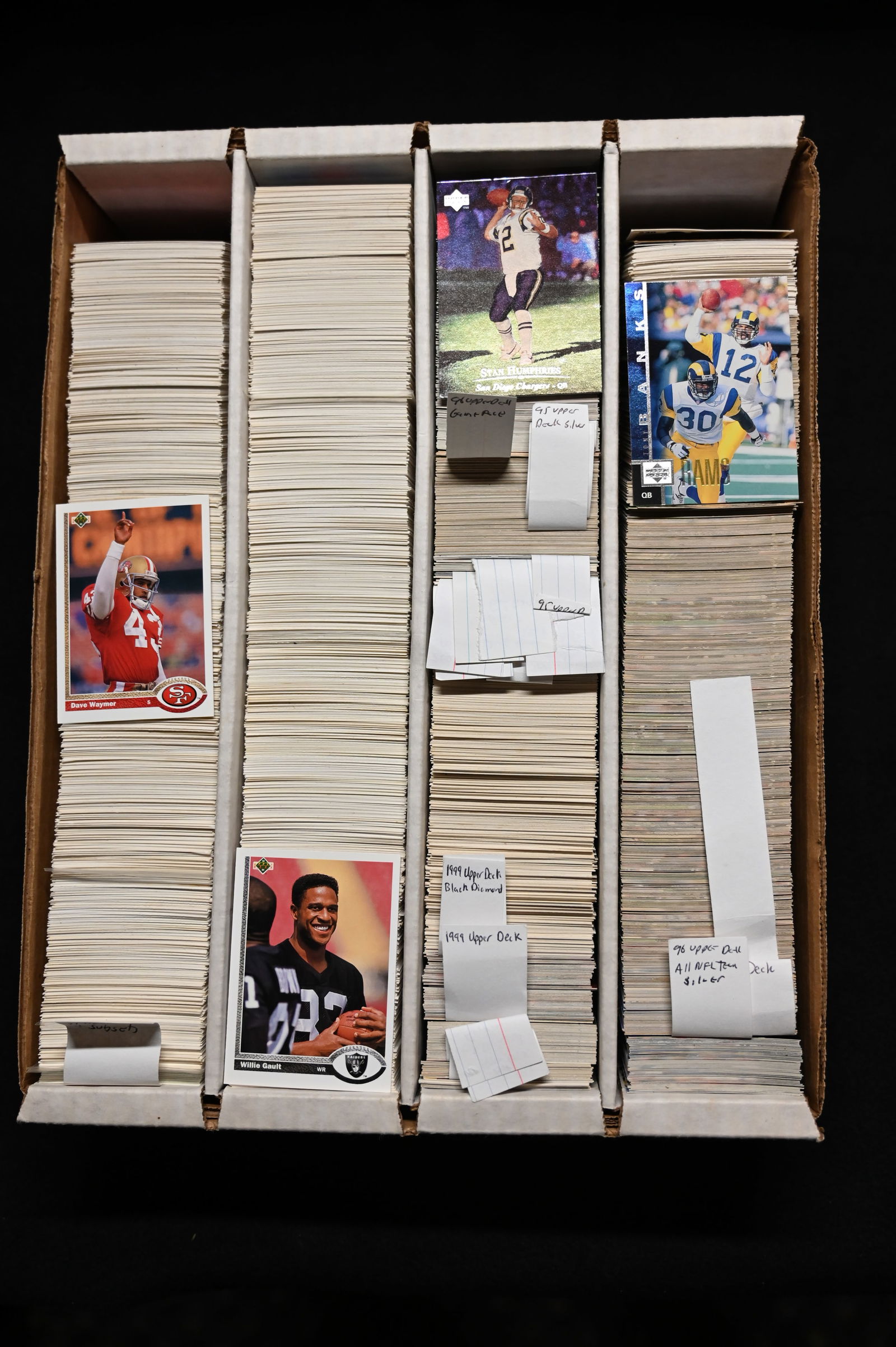 3000 Approx. Football Cards 1990's stored in a large collector card box. We did not search through: 3000 Approx. Football Cards 1990's stored in a large collector card box. We did not search through these just looked enough to get a description. A majority of the cards are in great condition.