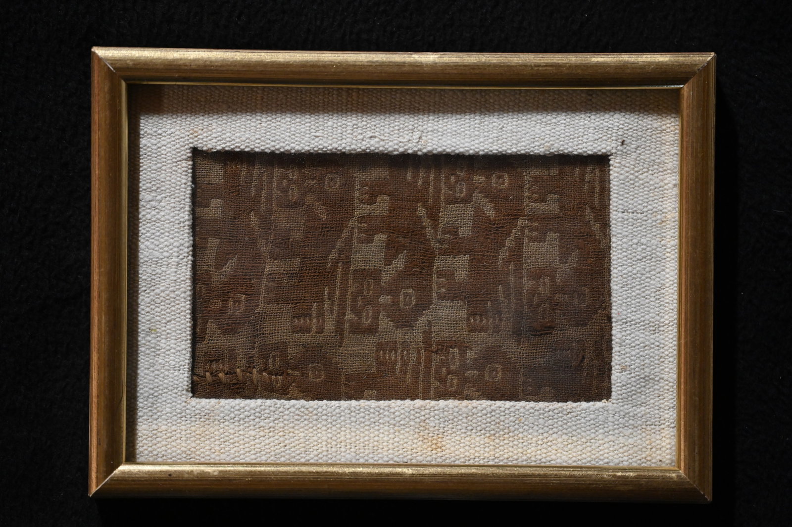 Chancay Textile Fragment.: Chancay textiles are renowned for their intricate designs and vibrant colors, originating from the Chancay culture, which flourished on the central coast of Peru between 1000 and 1470 AD. A typical Ch