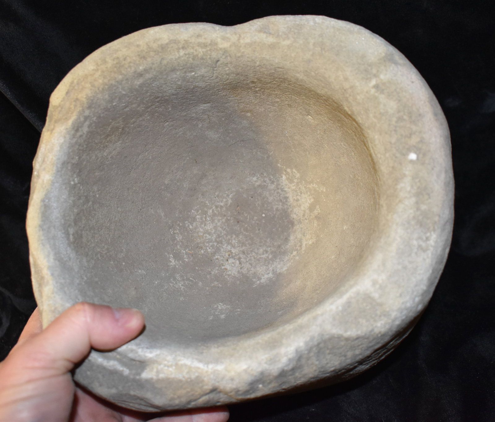 Extra Large Nisenan or Sierra Miwok Stone Bowl found in El Dorado County, CA: This substantial hand carved basalt stone bowl originates from El Dorado County, California. Shaped from a single boulder, the vessel measures approximately 6 3/4 inches in diameter, 5 3/4 inches deep