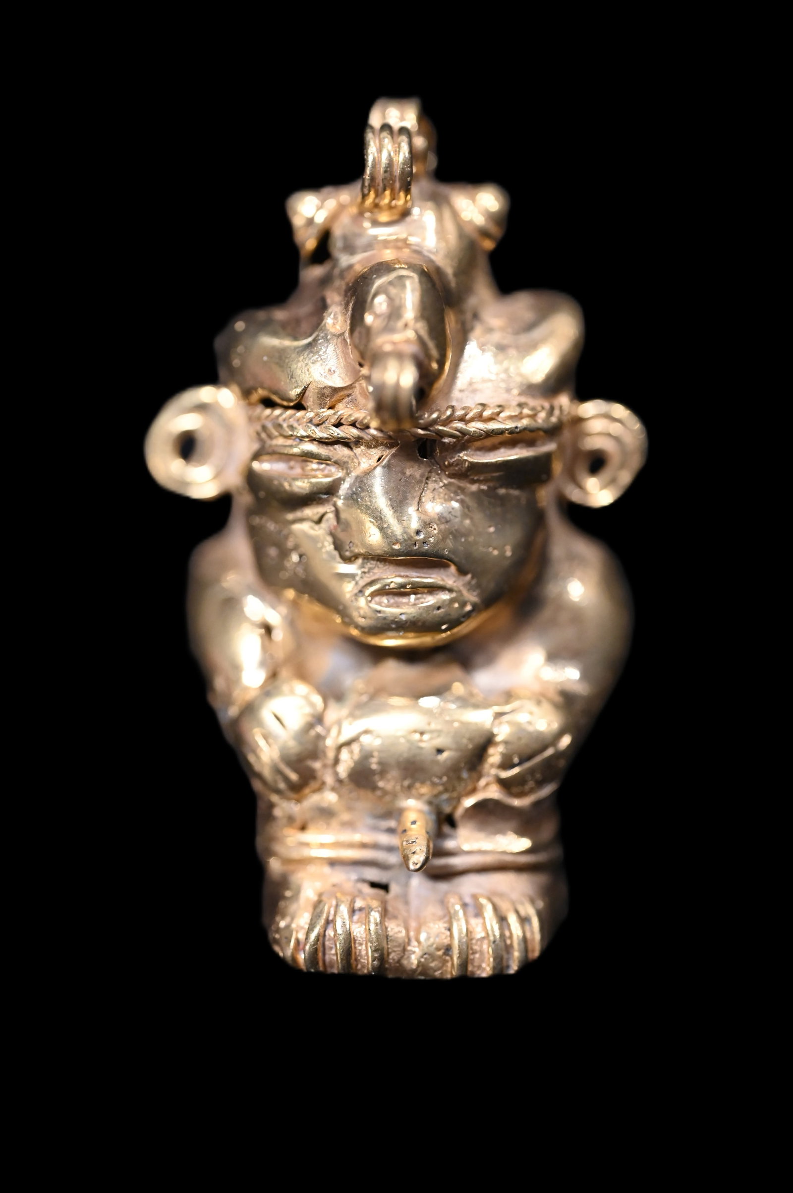 Tairona Tumbaga Pendant Figure.: These Pendants which are still made today have a gold content that is unknown. The knowlede of making them have been passed down for several generations.