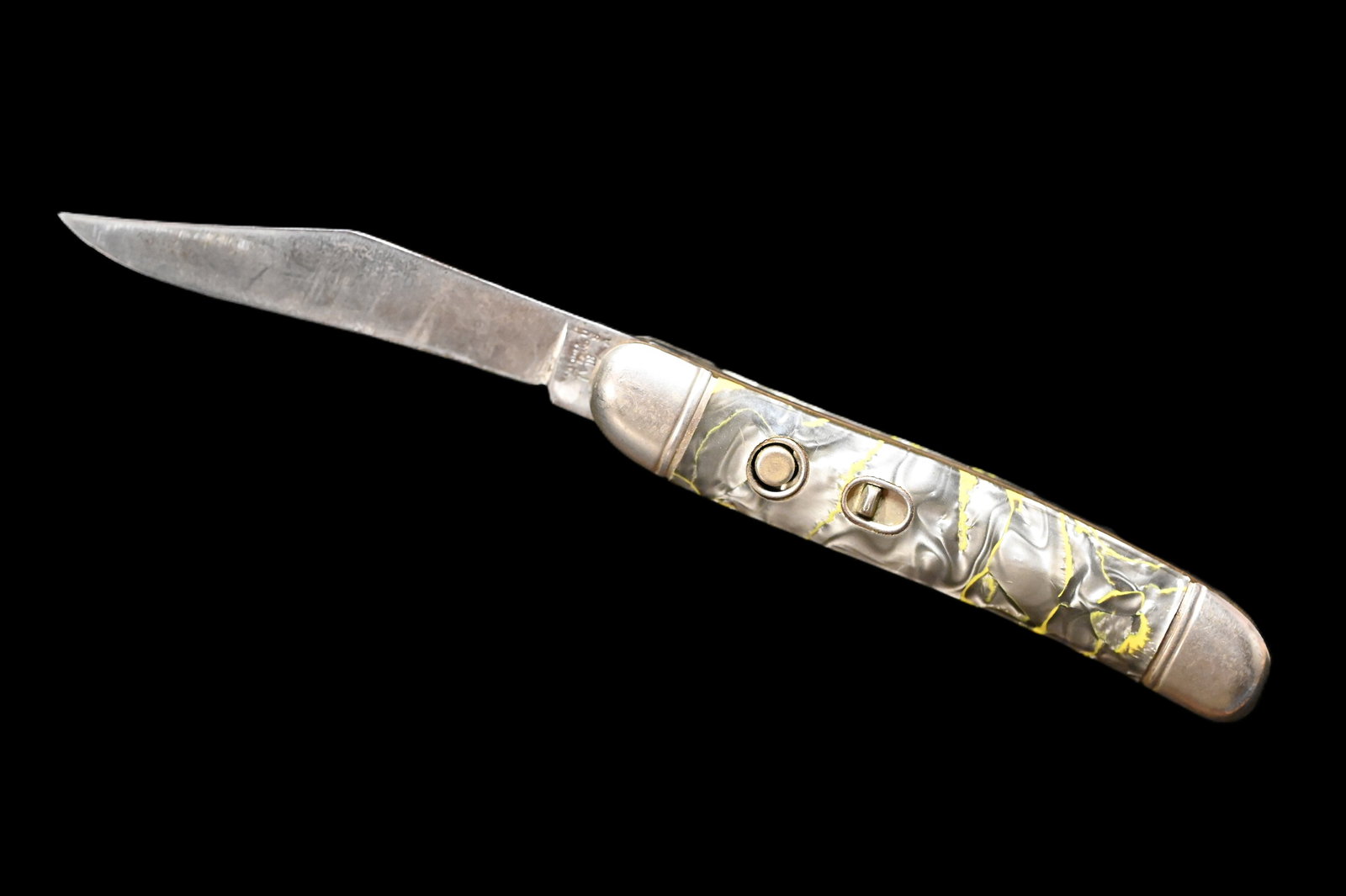 Hammer Brand Switchblade Knife 2 5/8" blade grey and yellow marble-patterned celluloid handle. (1 of 8)