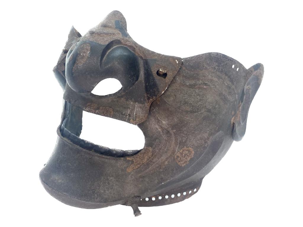 Japanese Samurai Iron Half Face Mask: Edo period, metal mask with ear and detachable nose, pinned teeth of a silver colored metal, 5-1/2 in. x 6-1/2 in., overall rust with color loss one ear missing