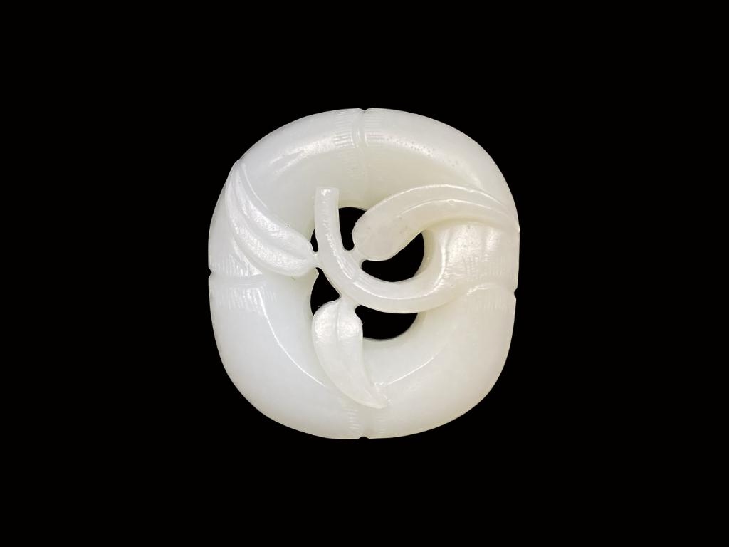 White Jade Carving of Bamboo: carved and reticulated bamboo with leaf branch, 2 in. x 1-7/8 in. excellent condition