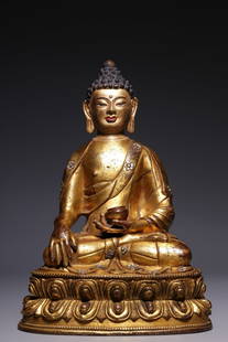 Gilt Bronze and Silver Inlaid Seated Buddha Statue: This is a gilded alloy copper statue of Sakyamuni Buddha in the meditation gesture, with a thin and lustrous gold layer and silver inlays (the silver inlays of the necklace and clothing details are wa
