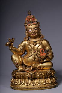 Qing Dynasty, Gilt Bronze, Seated Statue of Great Achi: This alloy copper gilded with gold (with mottled gold layer and partially painted in red and green mineral pigments to add mystery) represents a great accomplished master (a figure in Tibetan esoteric