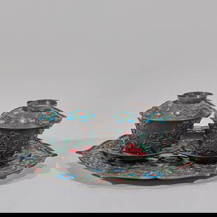 A set of silver tea cups and saucers with blue enamel floral patterns: The surface of the pure silver body is decorated with intense and vivid enamel colors, and the metallic texture is warm and mellow. The silver body is engraved with floral patterns and then fired with