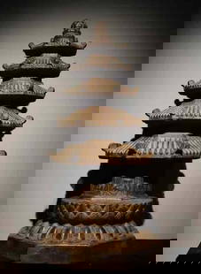 Tang Dynasty Bluestone Stupa: "Material: Bluestone.Craftsmanship: The multi-layered pagoda eaves are carved, with meticulous handling of the details of each eave corner and pagoda body. The shape imitates the pavilion-style pagoda