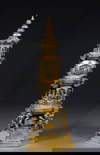 Gilt Bronze Pagoda with Buddha's Light: The Gilt-bronze Buddha's Light Illuminating the World Pagoda: Cast in gilt-bronze with a copper core, it features a multi-tiered pagoda structure created through the lost-wax method and chiseling, wit