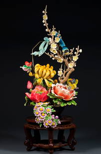 Qing Dynasty Precious Carved Artwork, Prosperity Blooms, Joy on the Branch, Bonsai: This exquisite and ingeniously crafted "Prosperous Flowers Bloom with Joy" bonsai features a variety of rare materials such as ivory, jade, and enamel as its base. It employs a combination of techniqu
