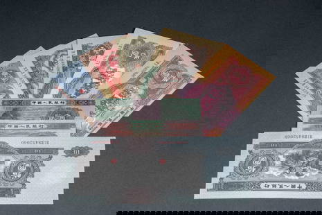A set of coins, totaling 8 pieces: This set of banknotes consists of 8 pieces. They are made of paper and produced by printing technology. It includes RMB of different denominations and editions from the modern and contemporary times.