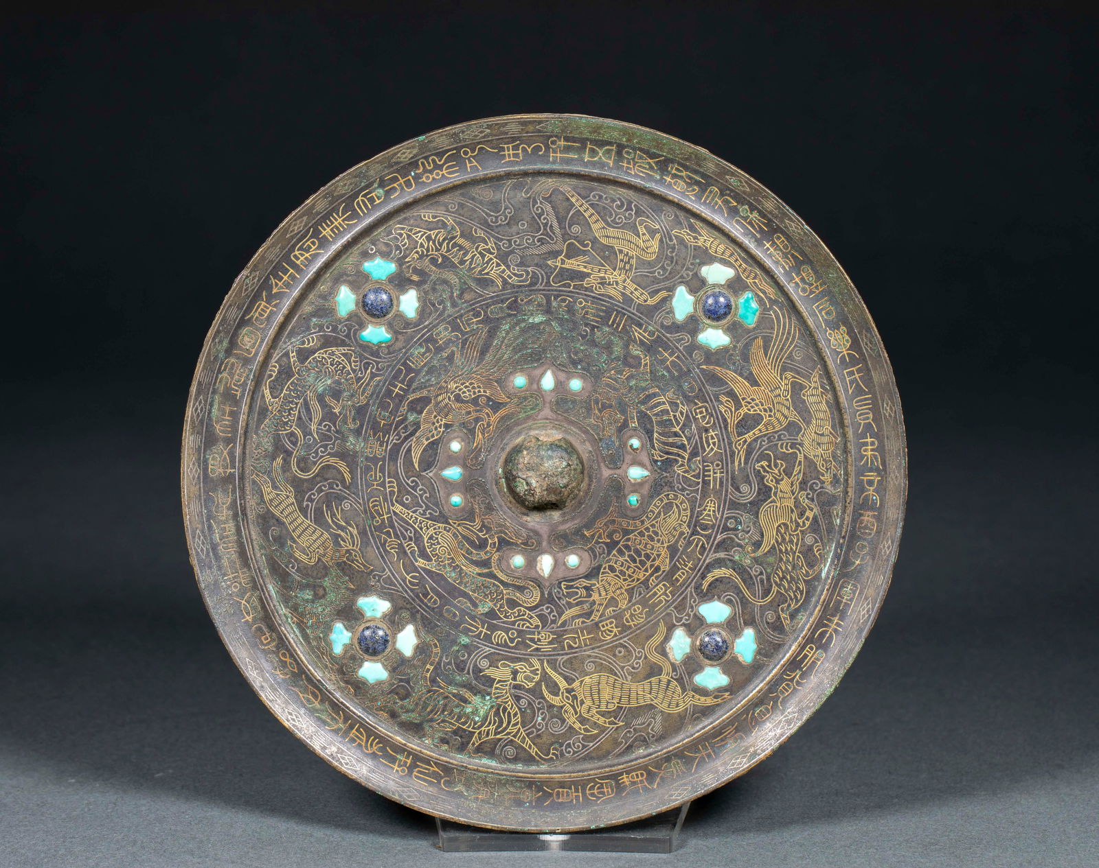 Bronze mirror with hunting scene and inscriptions, inlaid with silver and gold, before the Ming (1 of 11)