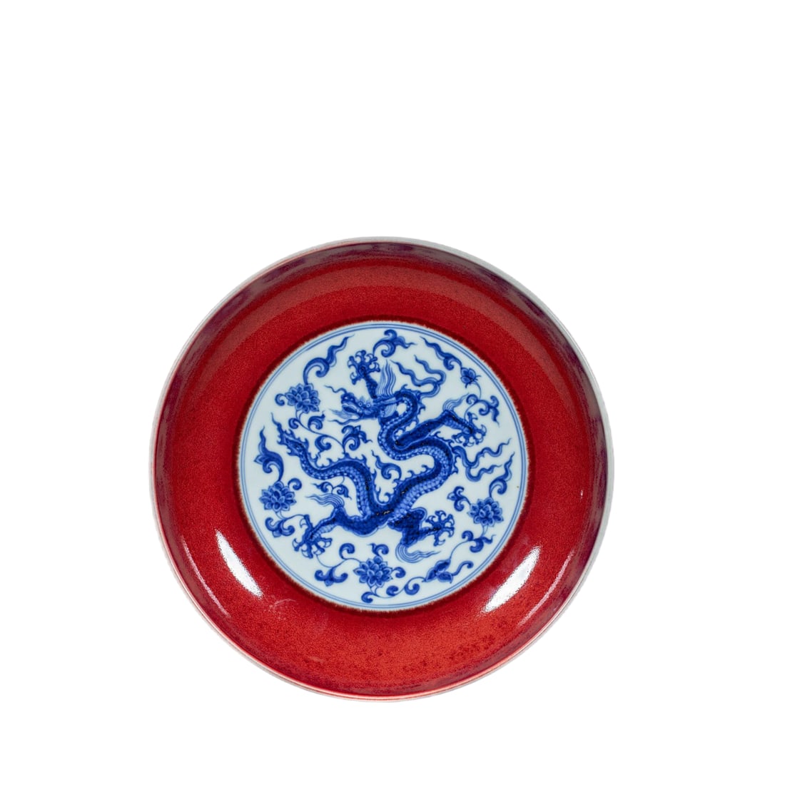 Jade Red Glaze with Blue and White Dragon Pattern Plate of Xuande Period of the Ming Dynasty: Jade Red Glaze with Blue and White Dragon Pattern Plate of Xuande Period of the Ming DynastyHeight: 4 cm, Diameter: 12.3 cm