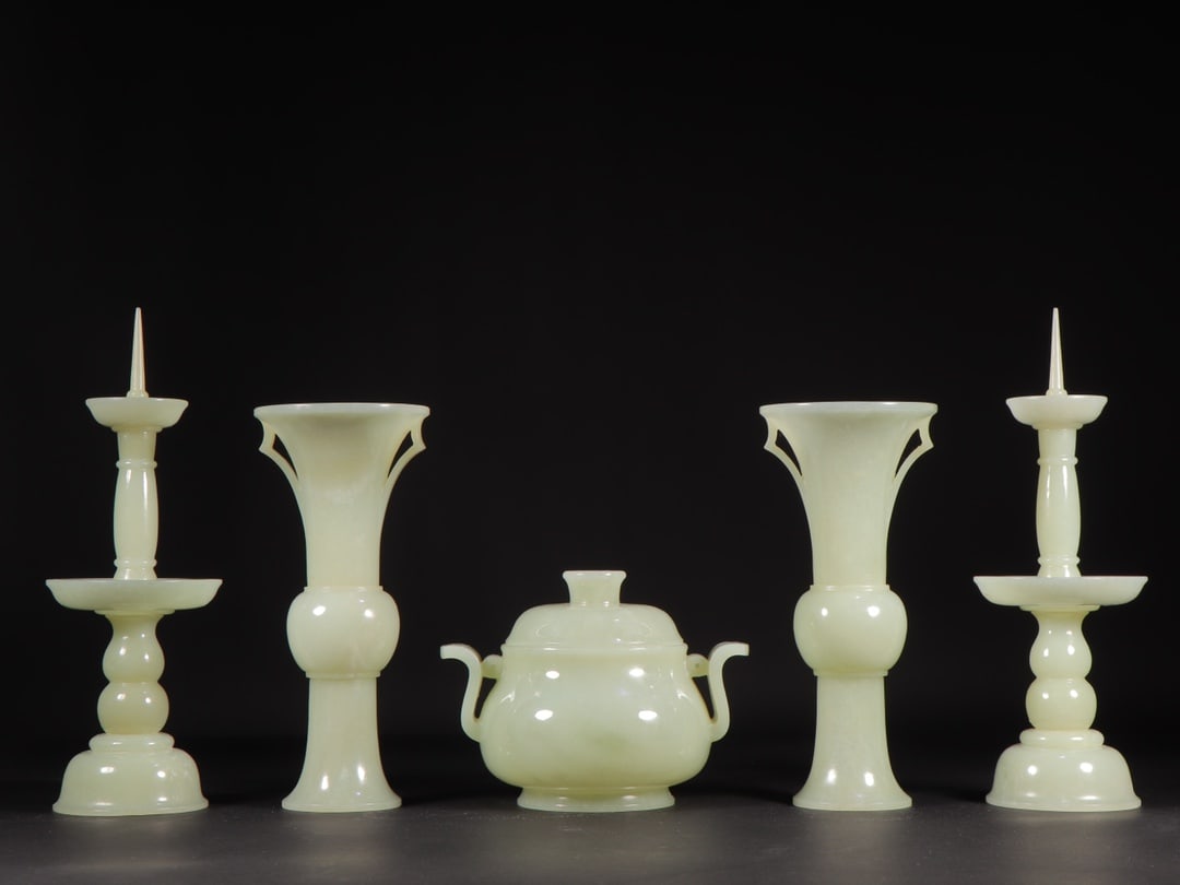 Qing Dynasty Hetian Jade Five Offerings for Buddha Hall: Qing Hetian Jade Five Offerings for Buddha Hall includes candlesticks (21cm high), an incense burner (13.1cm long, 9.9cm wide, 10cm high), and flower vases (7.4cm in diameter, 17cm high), with a total